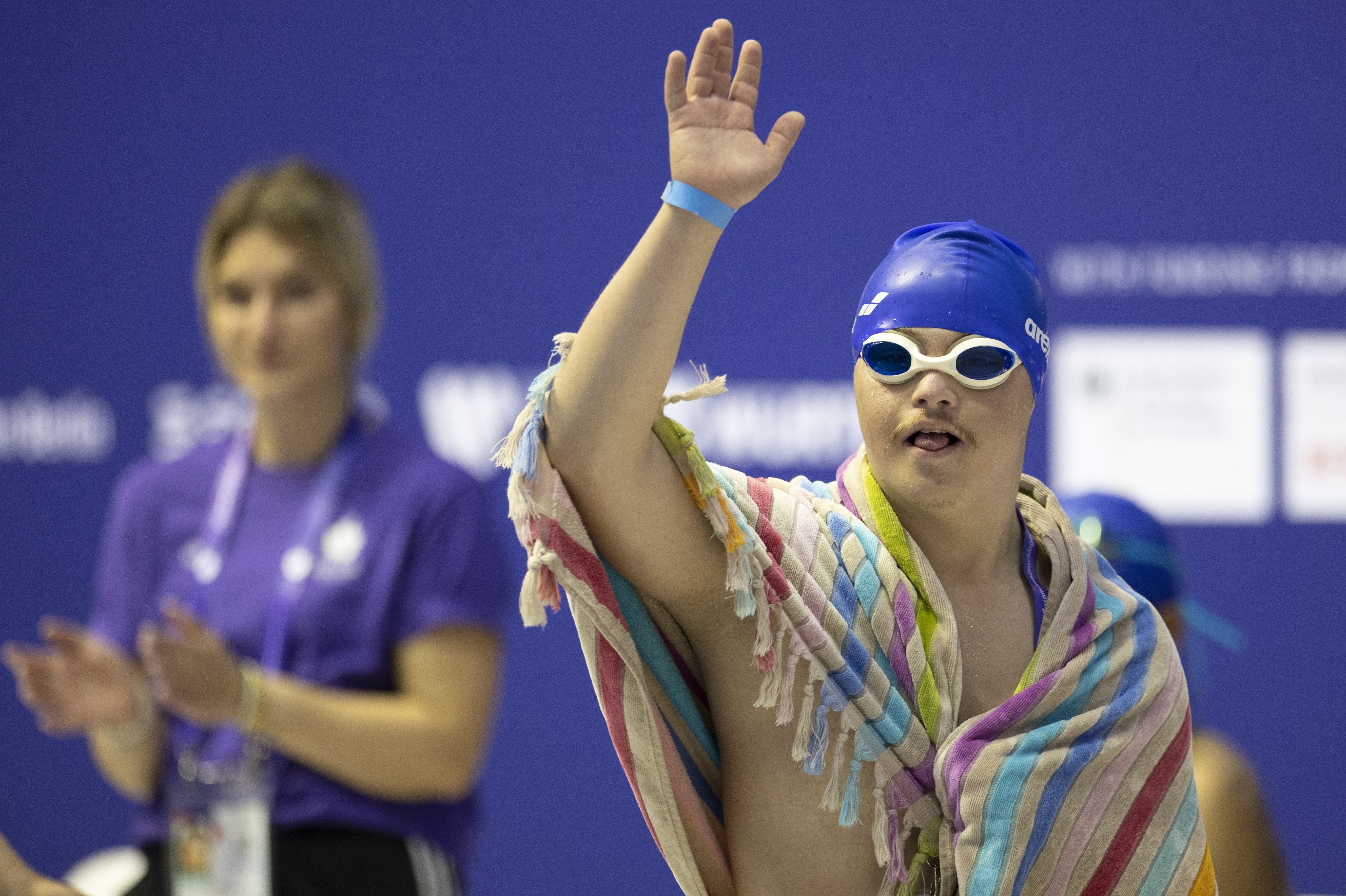 Efe Zeybek of Turkey waves to the fans prior the 400m Freestyle Men during day two of Special Olympics World Games Berlin 2023. 