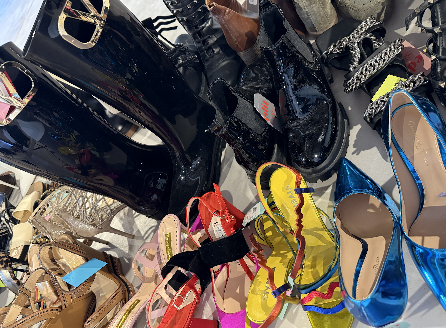 pile of designer shoes in raleigh nc