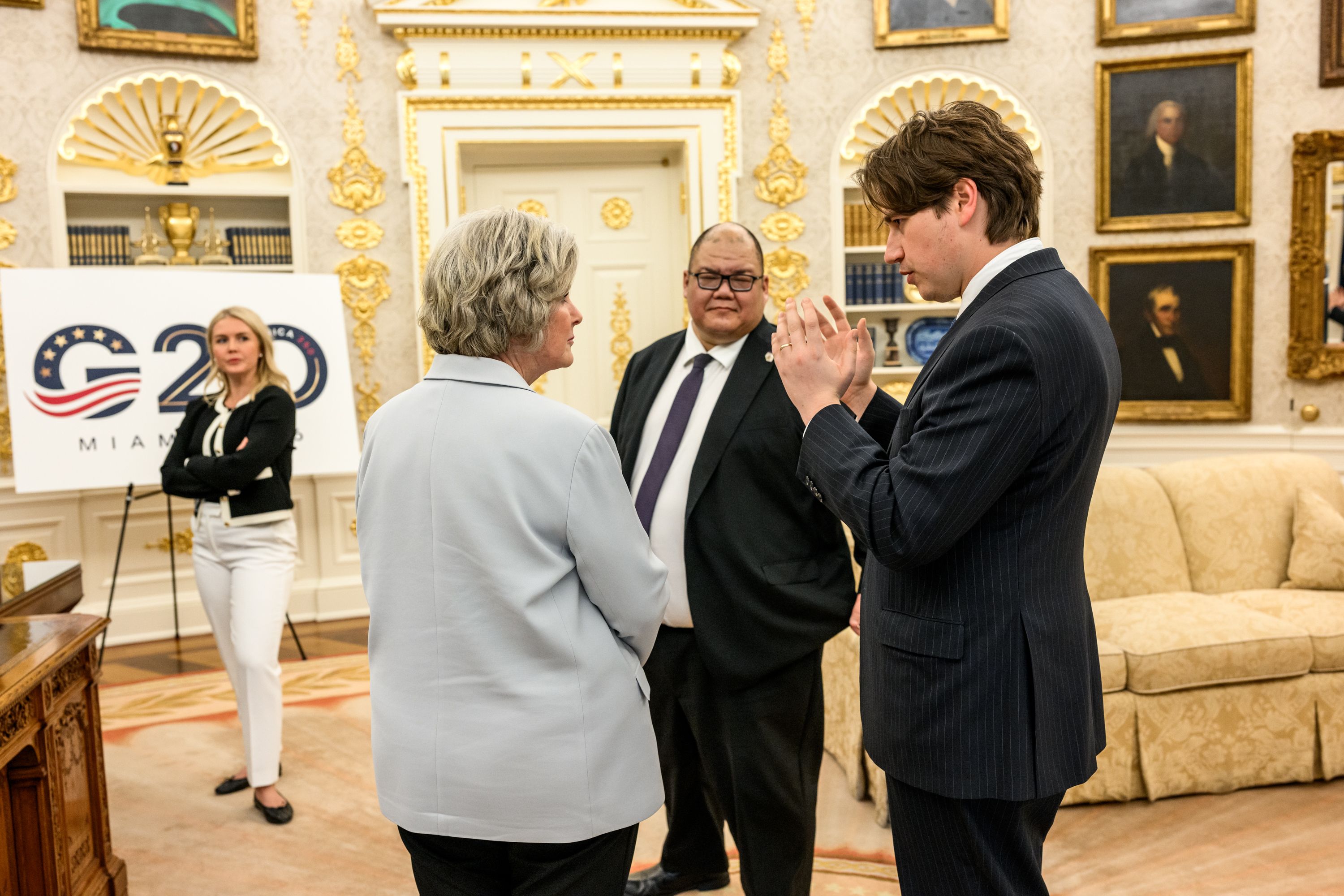 Alex Pfeiffer (right) in the Oval Office with (from left) White House press secretary Karoline Leavitt, chief of staff Susie Wiles and communications director Steven Cheung.