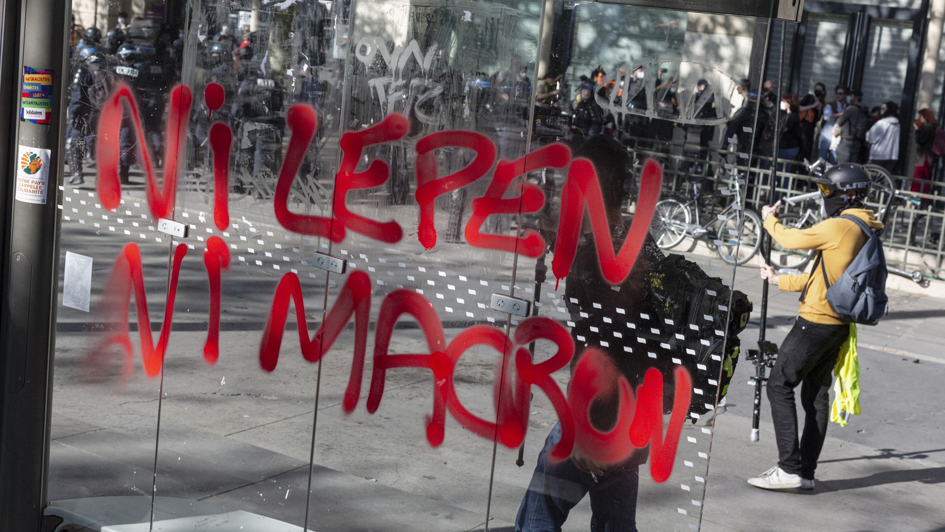 Grafitit that translates as "Neither Macron nor Le Pen" seen as protesters demonstrate 
