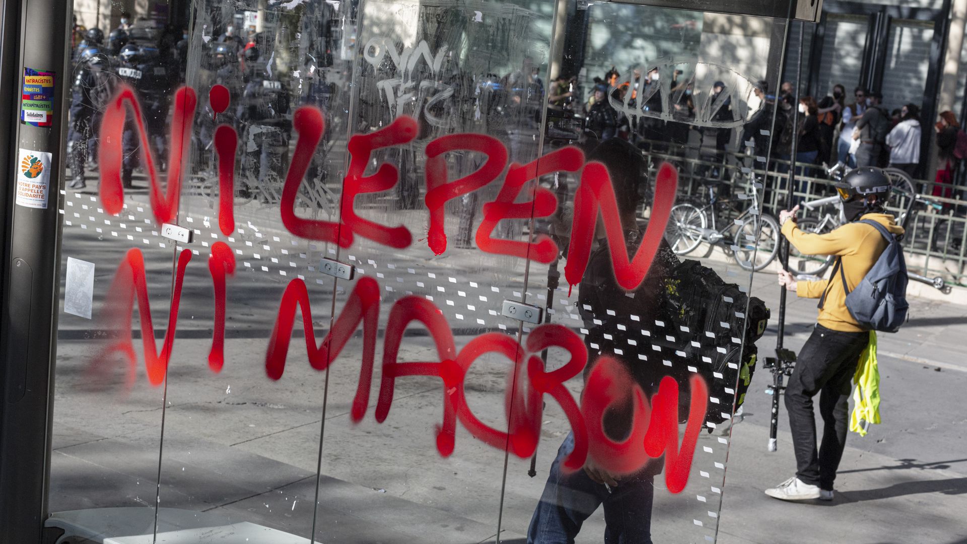 Grafitit that translates as "Neither Macron nor Le Pen" seen as protesters demonstrate