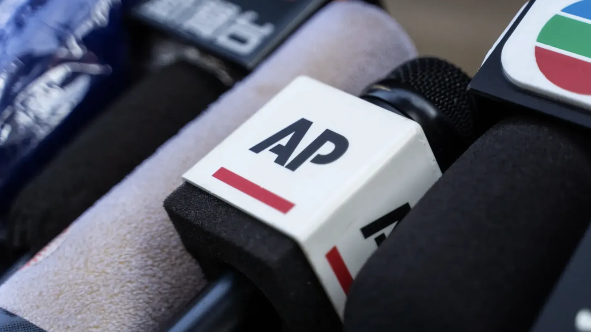 An Associated Press microphone. Photo: Chan Long Hei/SOPA Images/LightRocket via Getty Images