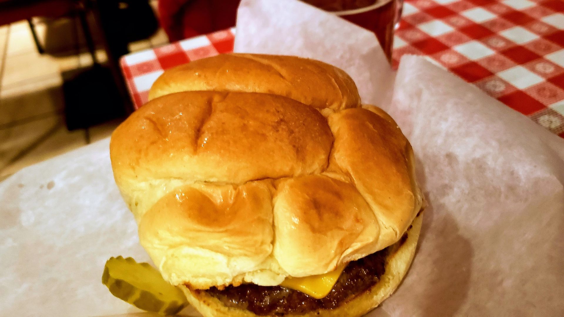Photo of a hamburger on a table.