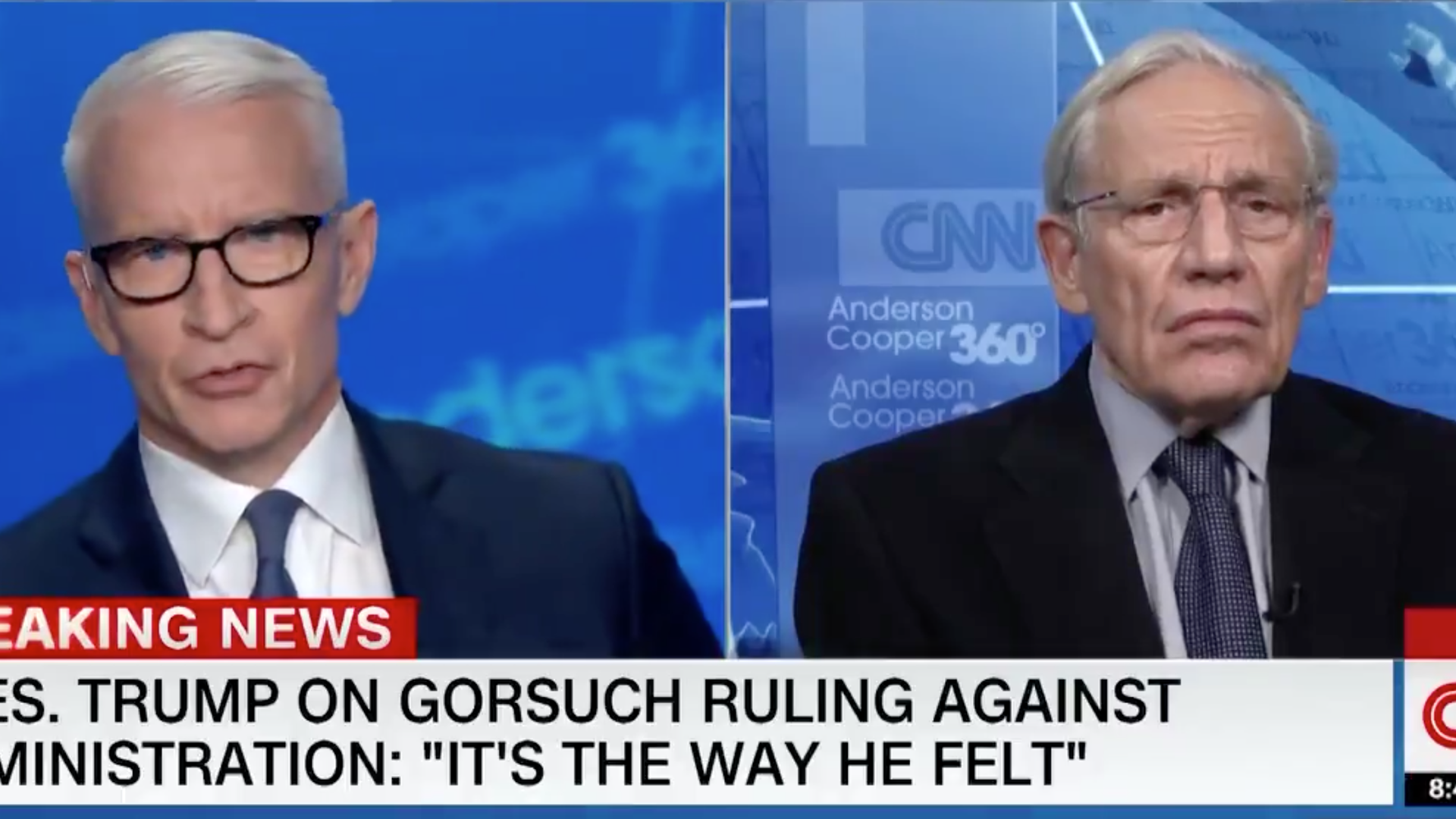 A screenshot of journalists Anderson Cooper and Bob Woodward on CNN.
