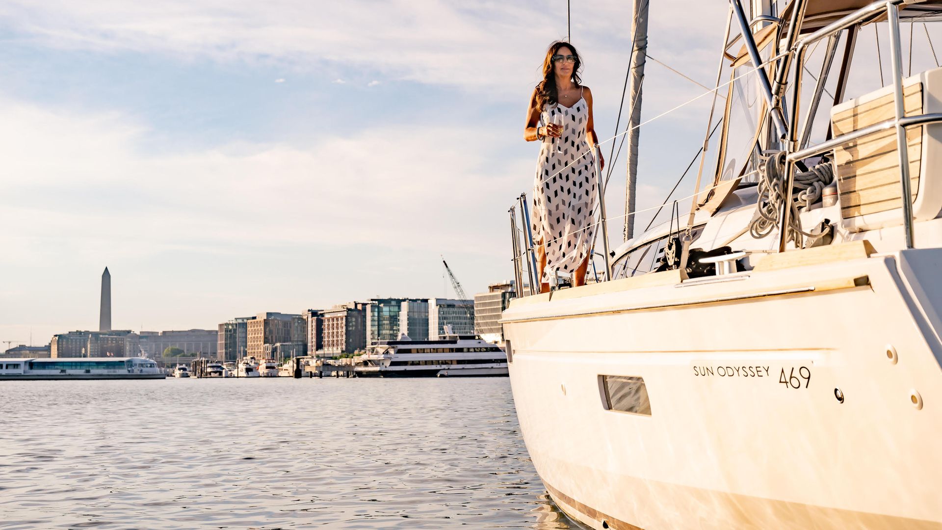 A woman on a sail boat near the Wharf in DC