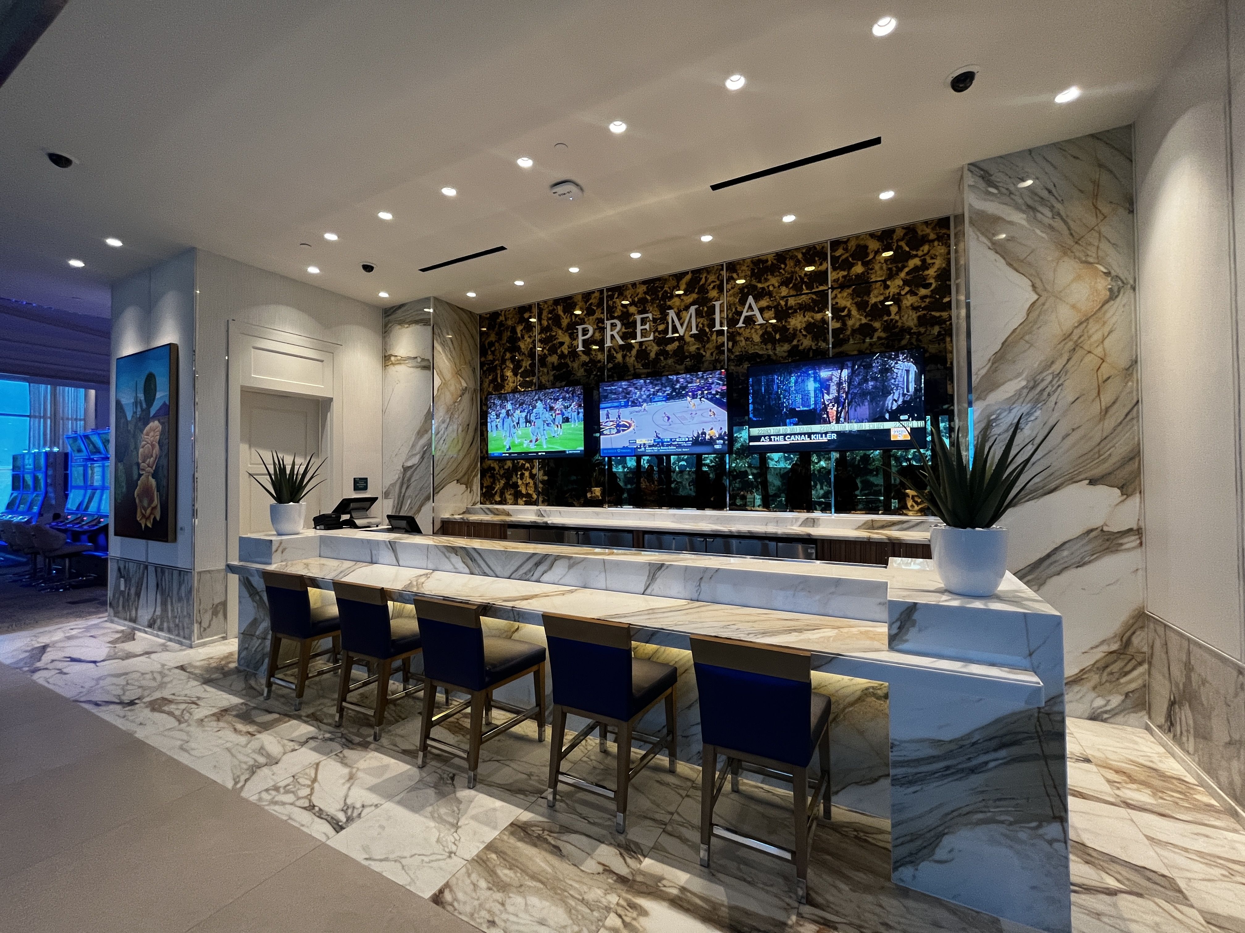 A white bar that says "Premia."