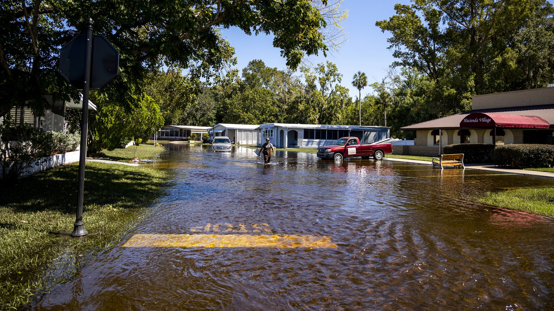 Hacienda Village, a 55-plus manufactured homes community in Winter Springs, Florida, saw major flooding from Hurricane Ian, with roadways still under water on Sunday, Oct. 2.