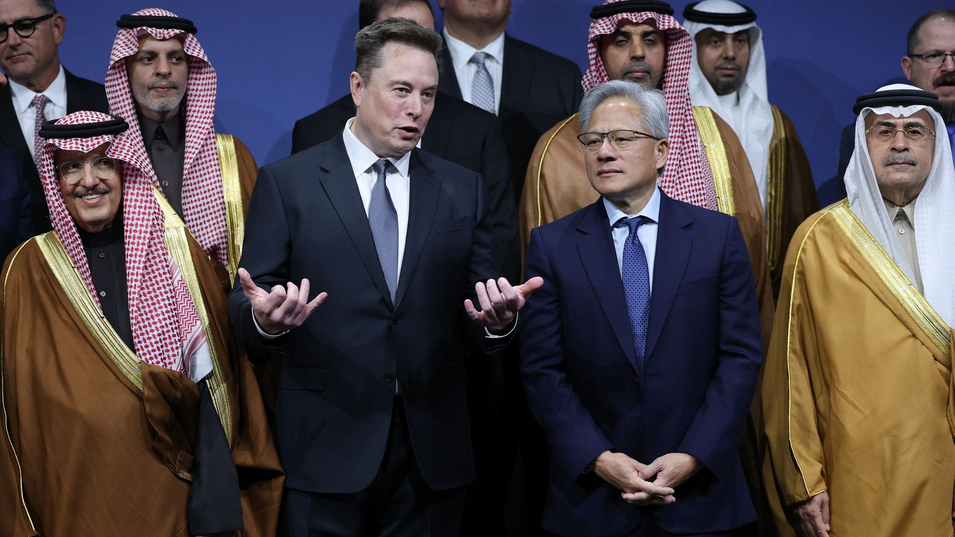 Elon Musk talks with Nvidia CEO Jensen Huang during the U.S.-Saudi Investment Forum at the Kennedy Center on November 19, 2025 in Washington, DC.