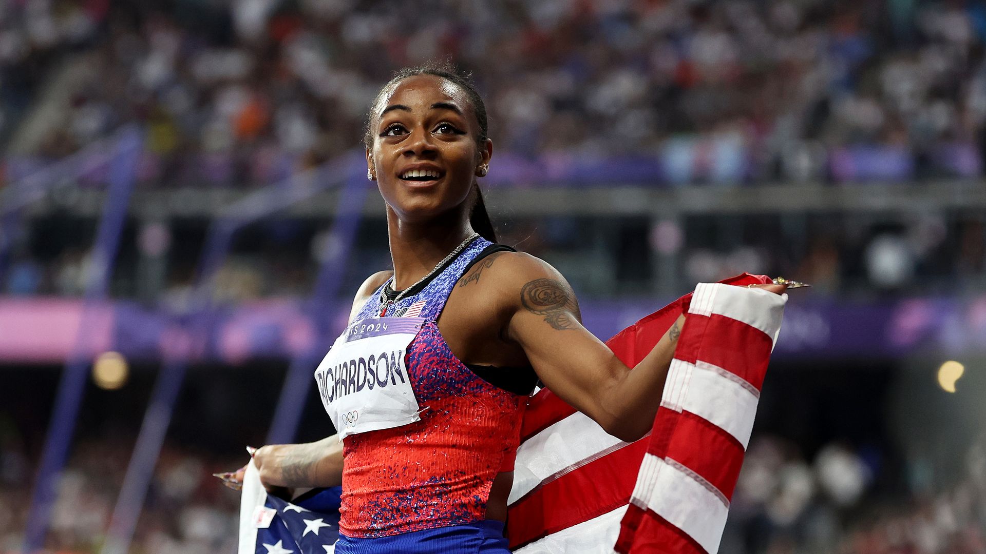 Sha'Carri Richardson of Team United States celebrates winning the silver medal at the Paris Olympics