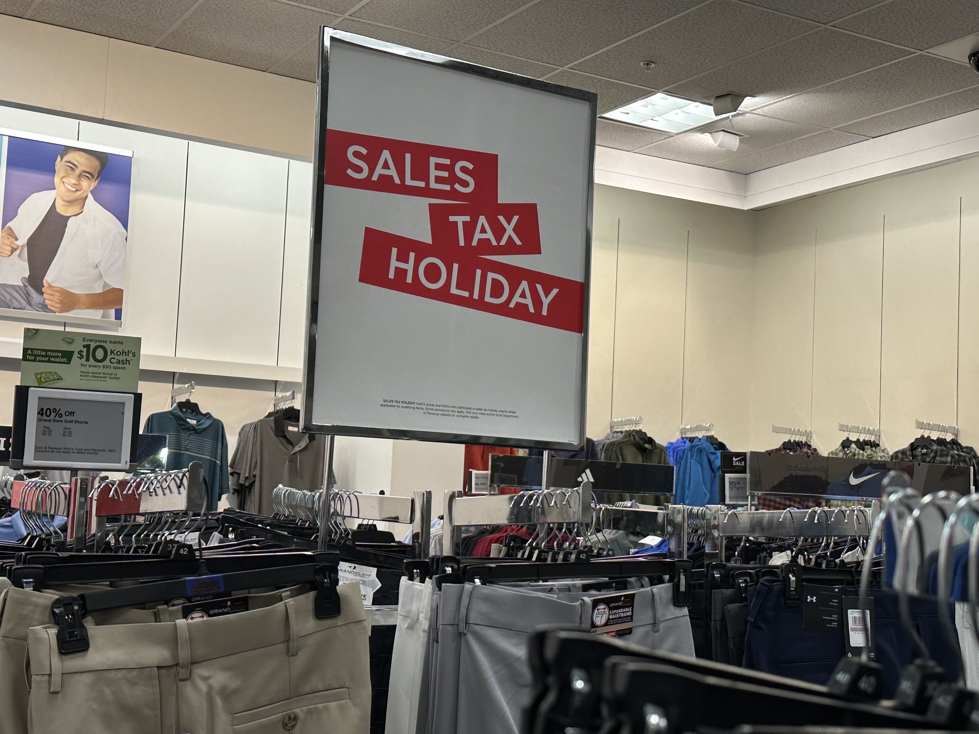 Sign in a store that says "Sales Tax Holiday"