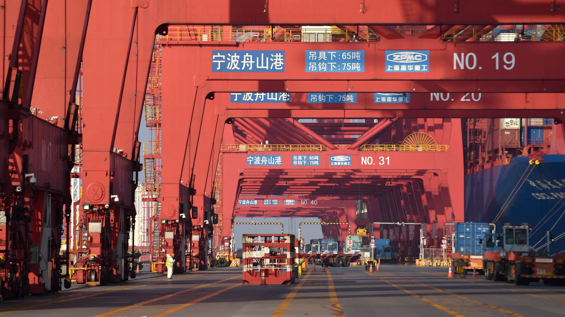 Trucks are ready for shipment at Meidong Dock of the Ningbo-Zhoushan port in China