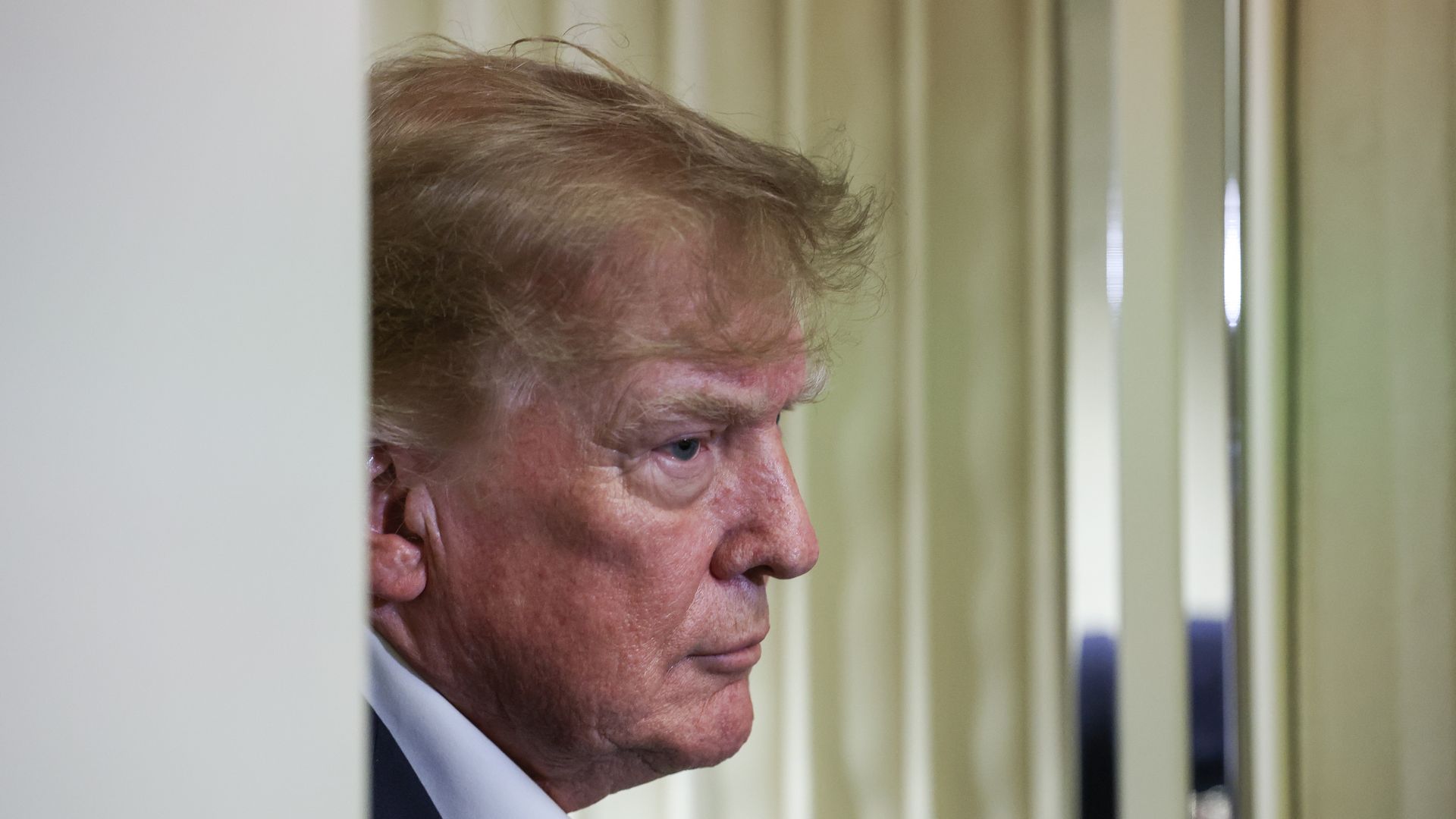 President Trump speaks to reporters aboard Air Force One on Sept. 13.