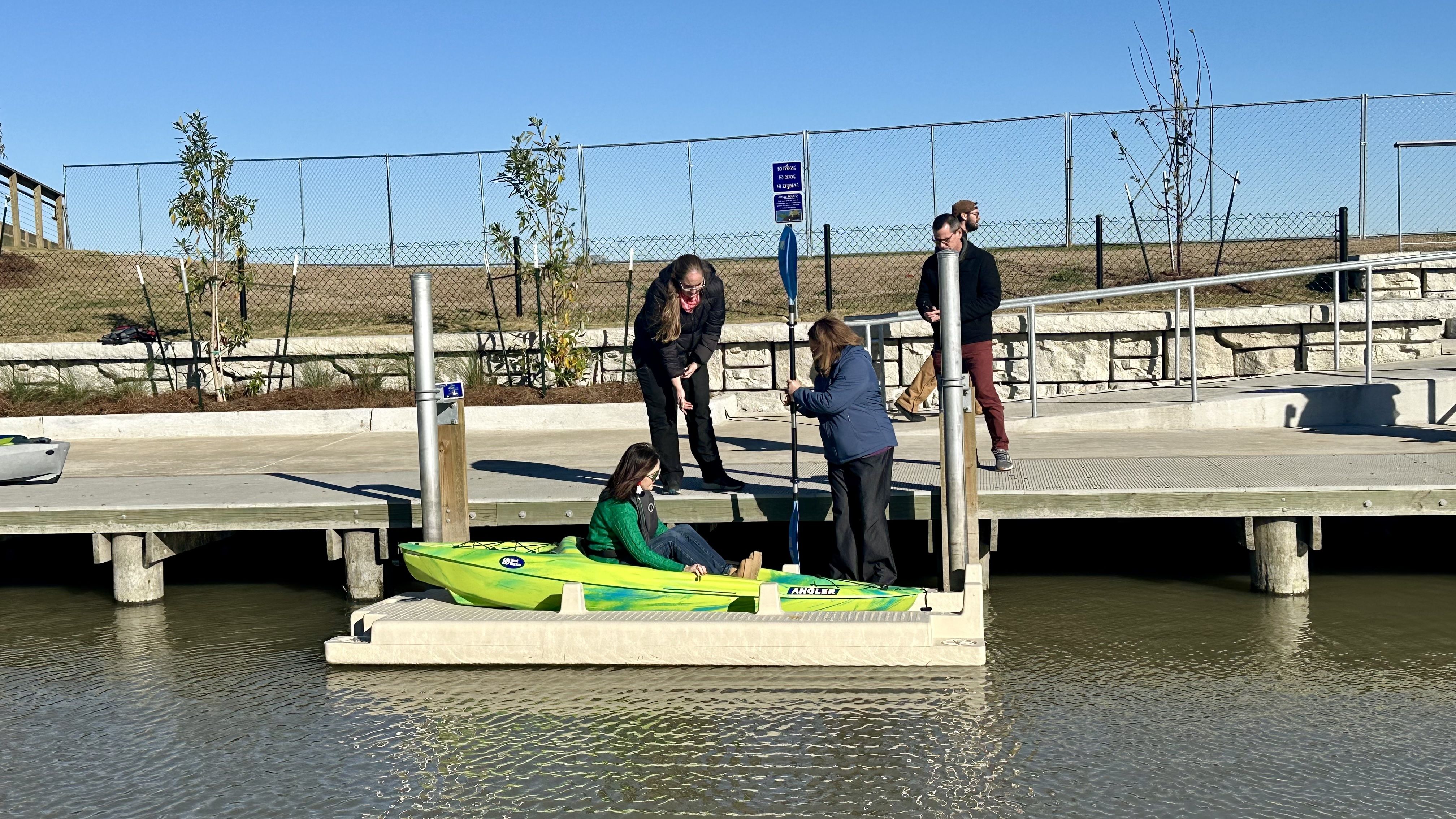 Image shows a person using the kayak launch.