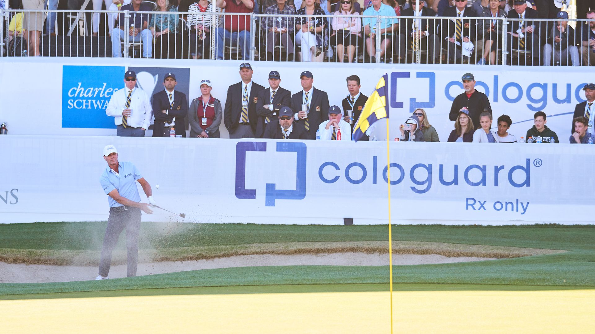 A golfer hits a shot at a 2018 tournament sponsored by Cologuard.
