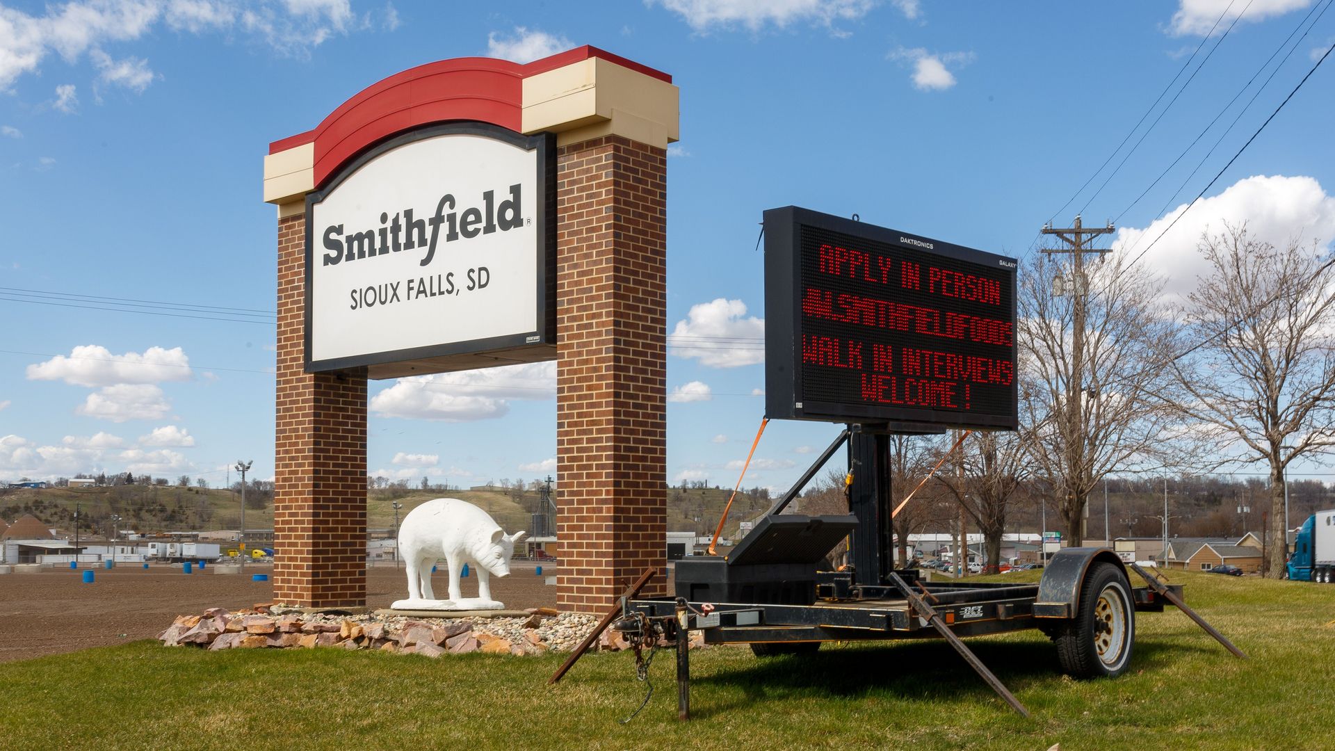 A sign outside the Smithfield Foods pork processing plant in South Dakota that says "walk-in interviews welcome"