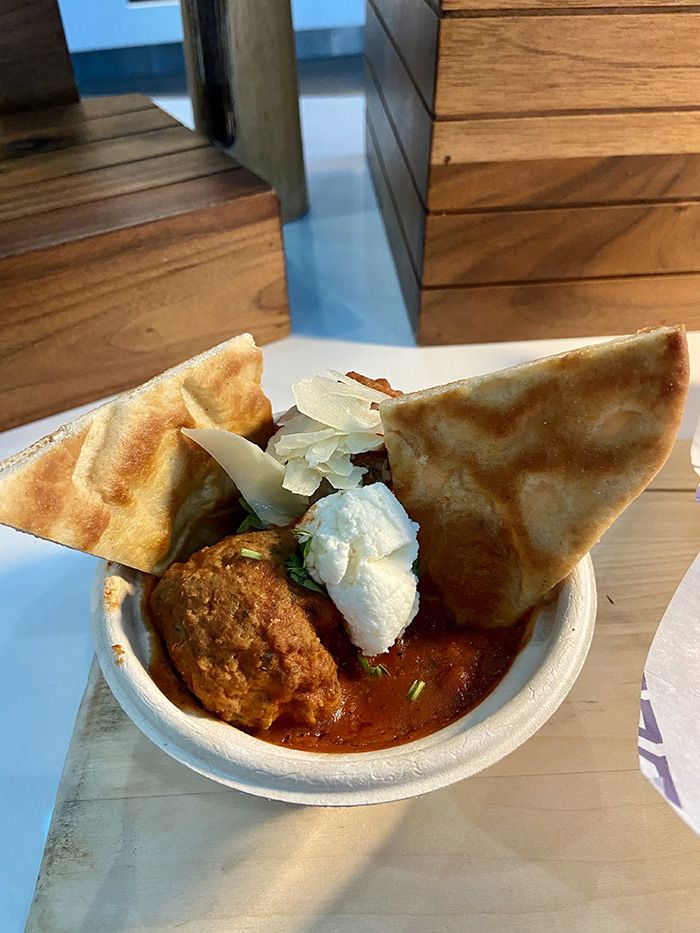 Meatball bowl: beef meatballs with marinara sauce, ricotta cheese and focaccia bread sticks. Photo: Ashley Mahoney/Axios 