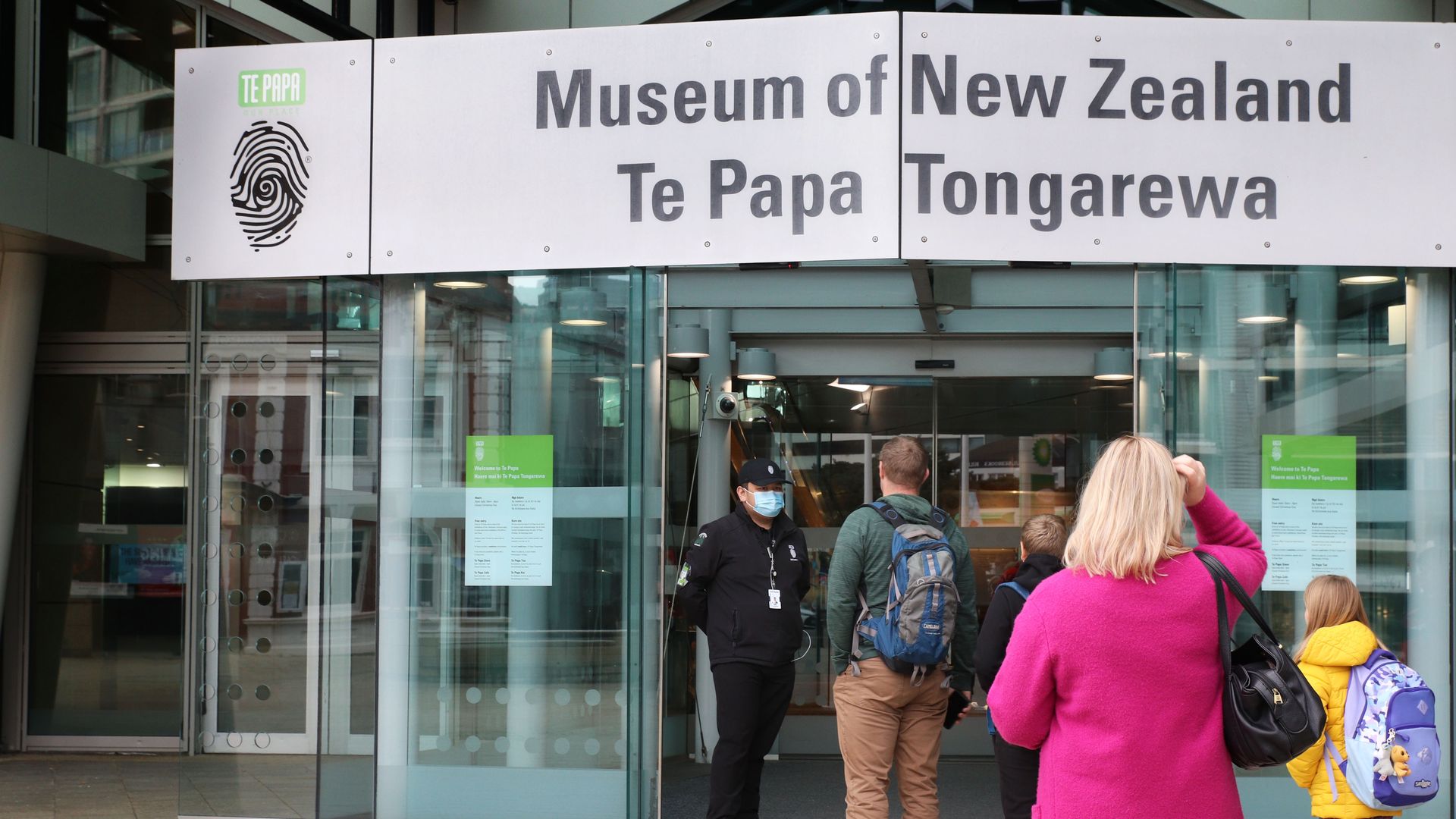 A security guard in a medical face mask turns away visitors to the Te Papa National Museum, where there was a Covid-19 exposure site, on June 23, 2021 in Wellington, New Zealand.