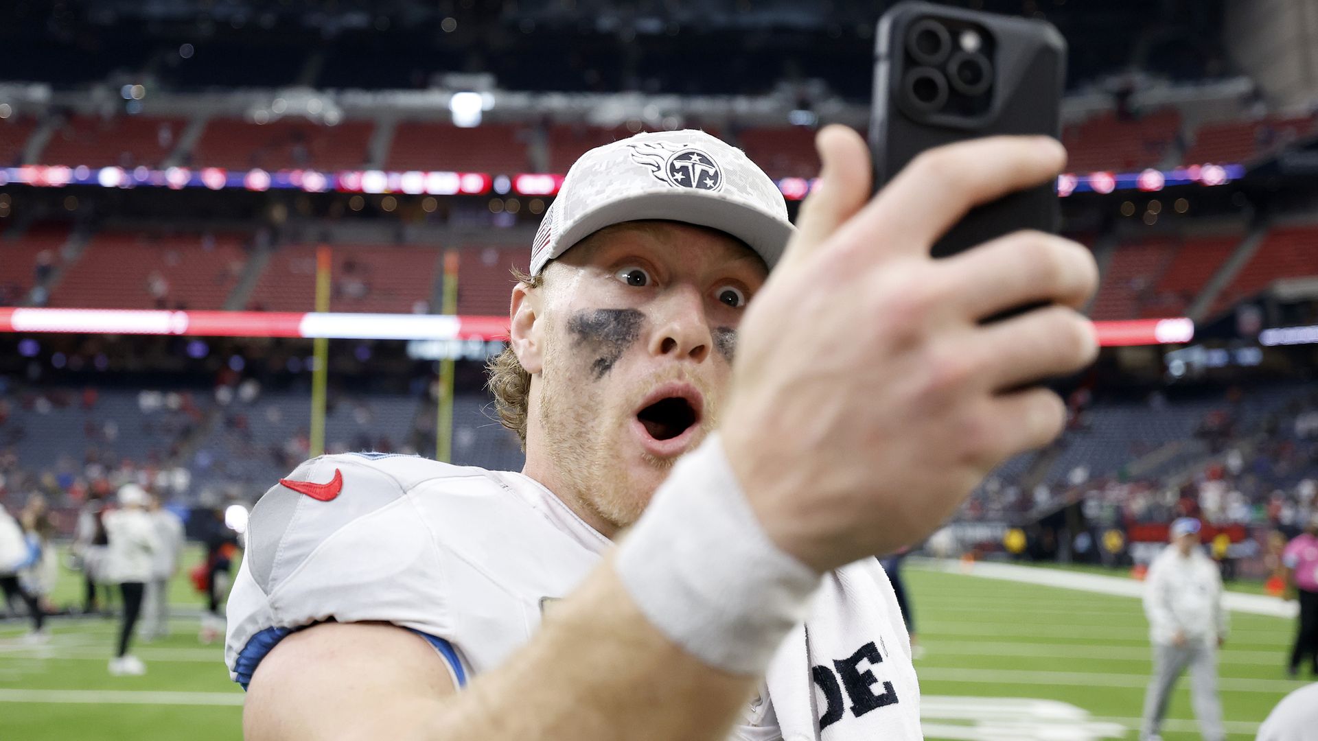 Will Levis #8 of the Tennessee Titans celebrates after defeating the Houston Texans 32-27 at NRG Stadium on November 24, 2024 in Houston, Texas.