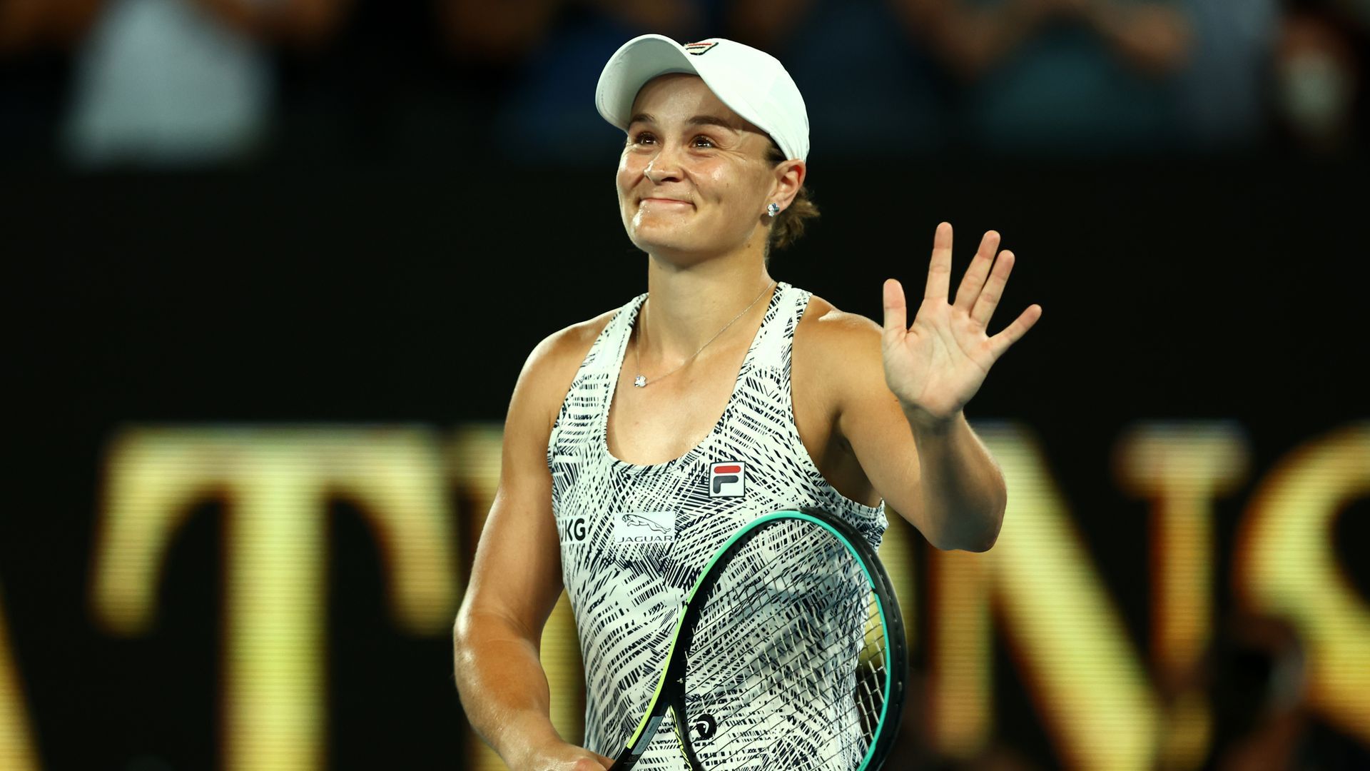 Ashleigh Barty waves after her victory.