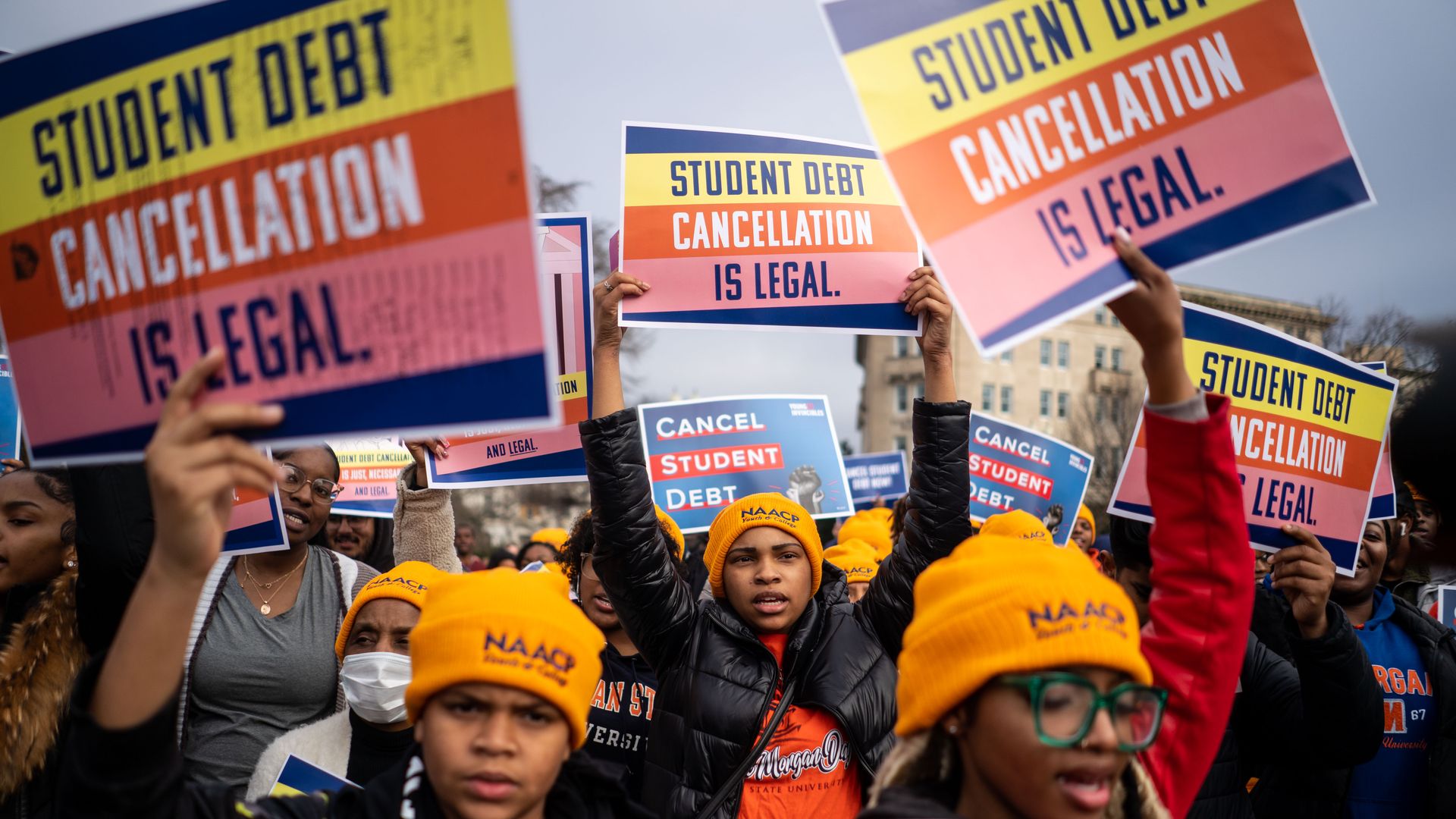 People rally to show support for the Biden administrationâs student debt relief plan in front of the Supreme Court on Feb. 28 in Washington, D.C