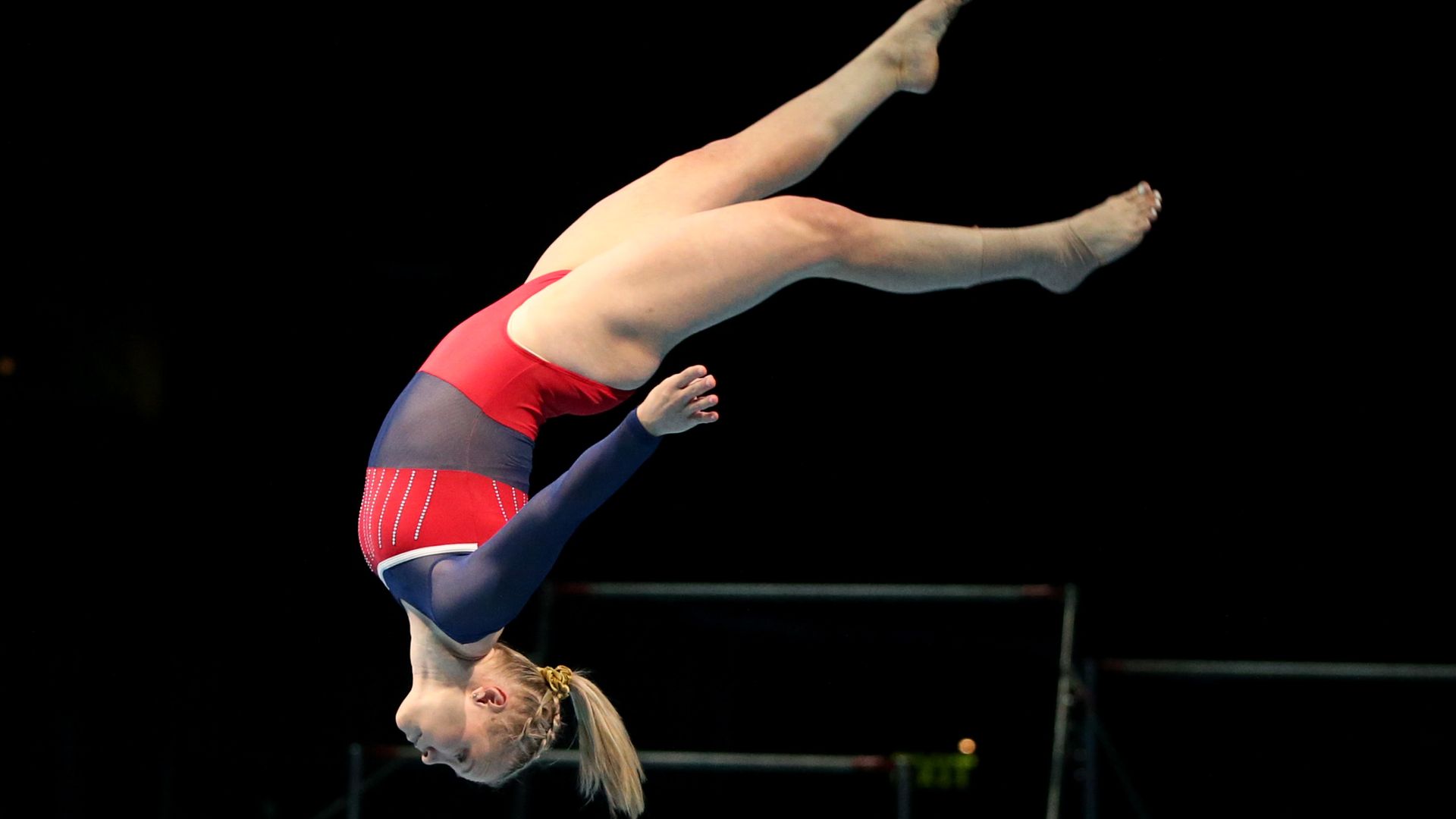 Jade Carey doing a flip in mid air