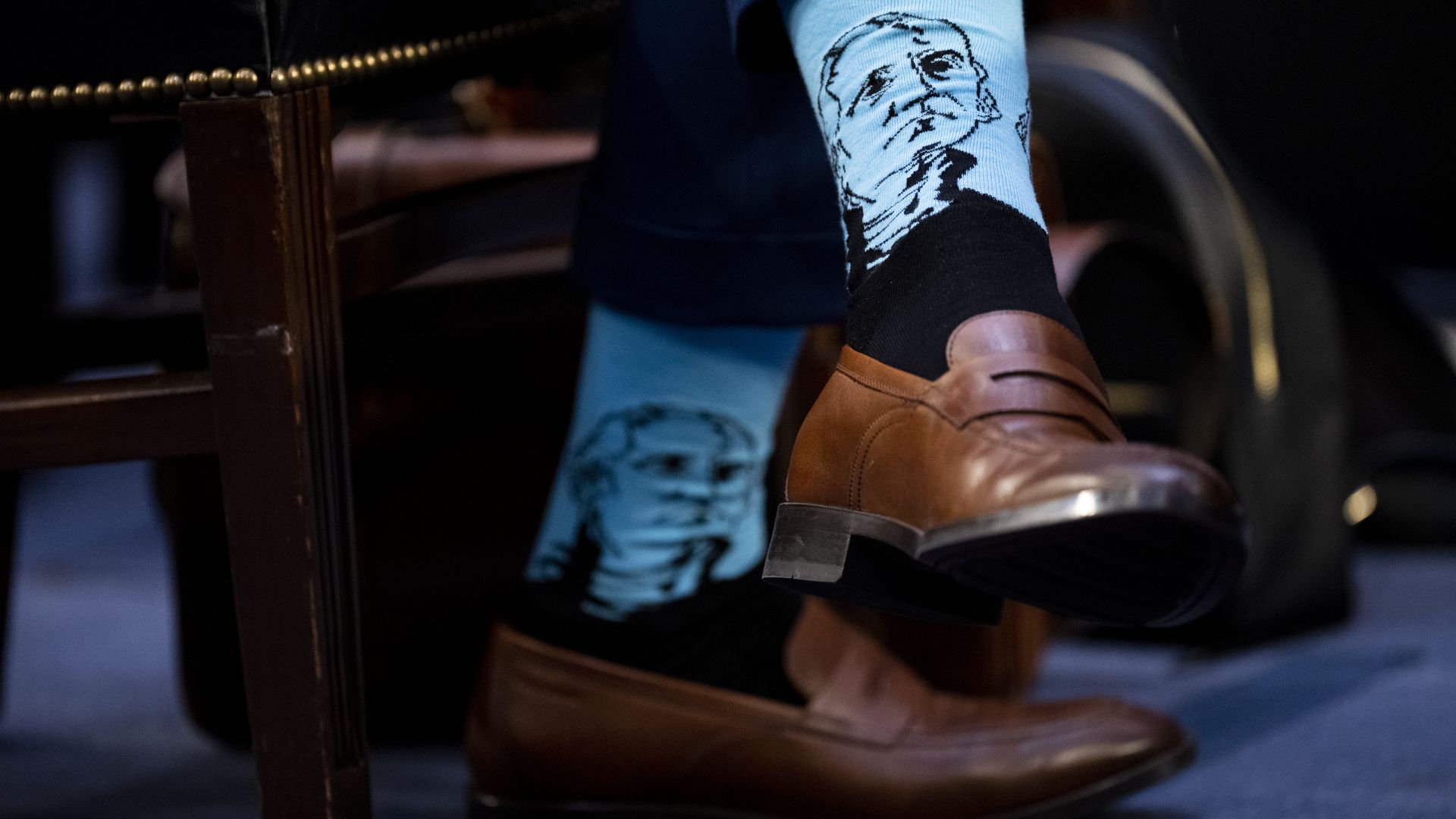 The portrait of Thomas Jefferson is seen on the socks of Patrick Johnson, husband of Supreme Court nominee Ketanji Brown Jackson.