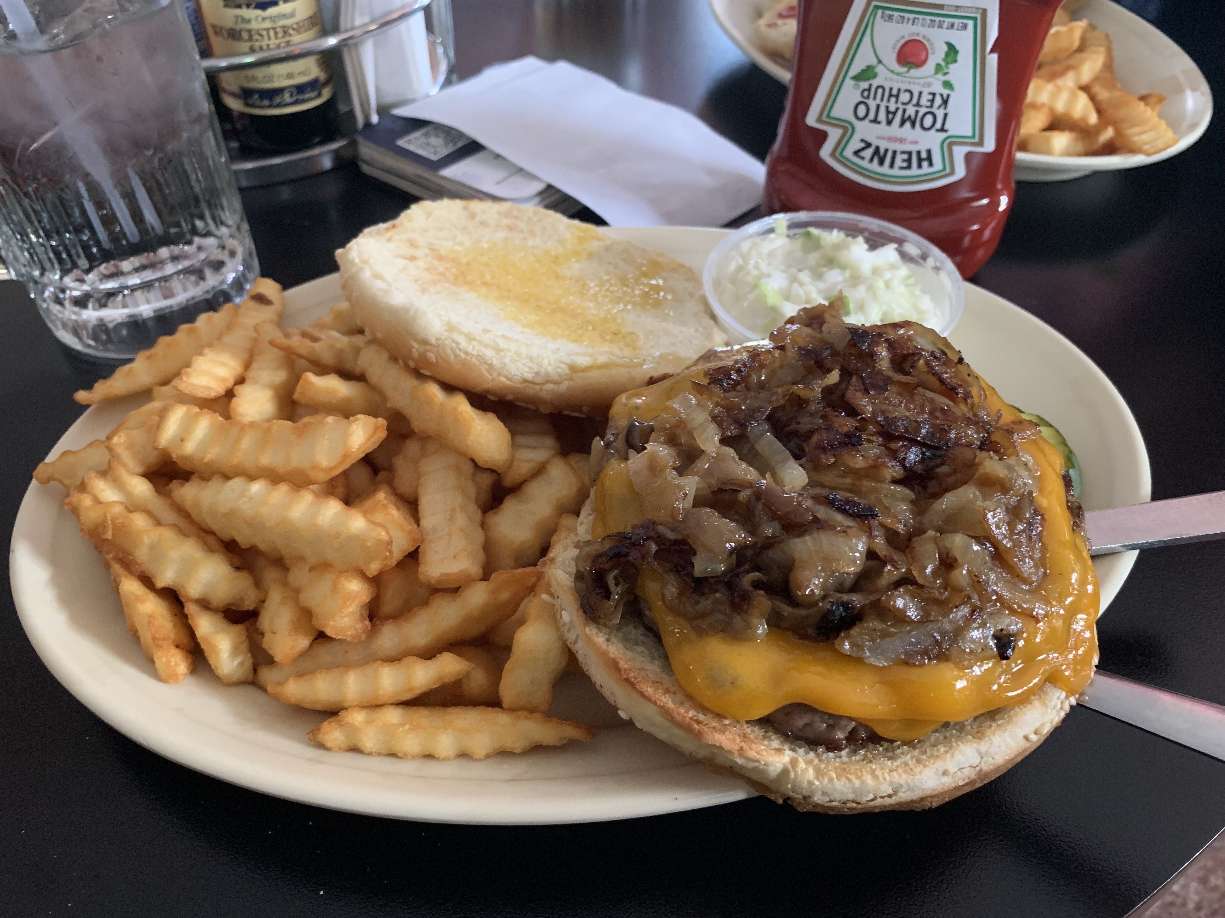 Photo of a cheeseburger with grilled onions 