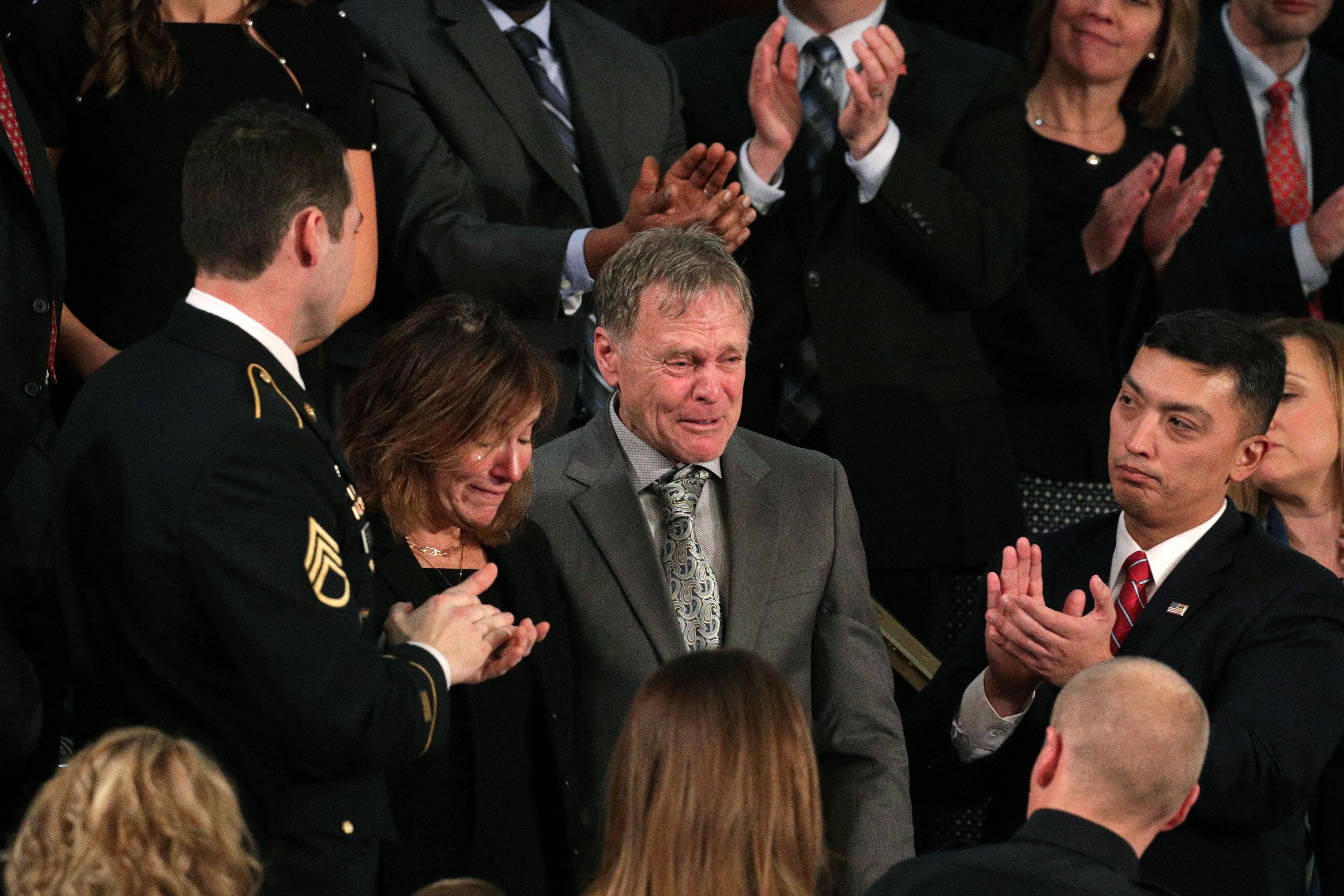 Otto Warmbier's parents, Cindy and Fred, are recognized at Trump's State of the Union address.