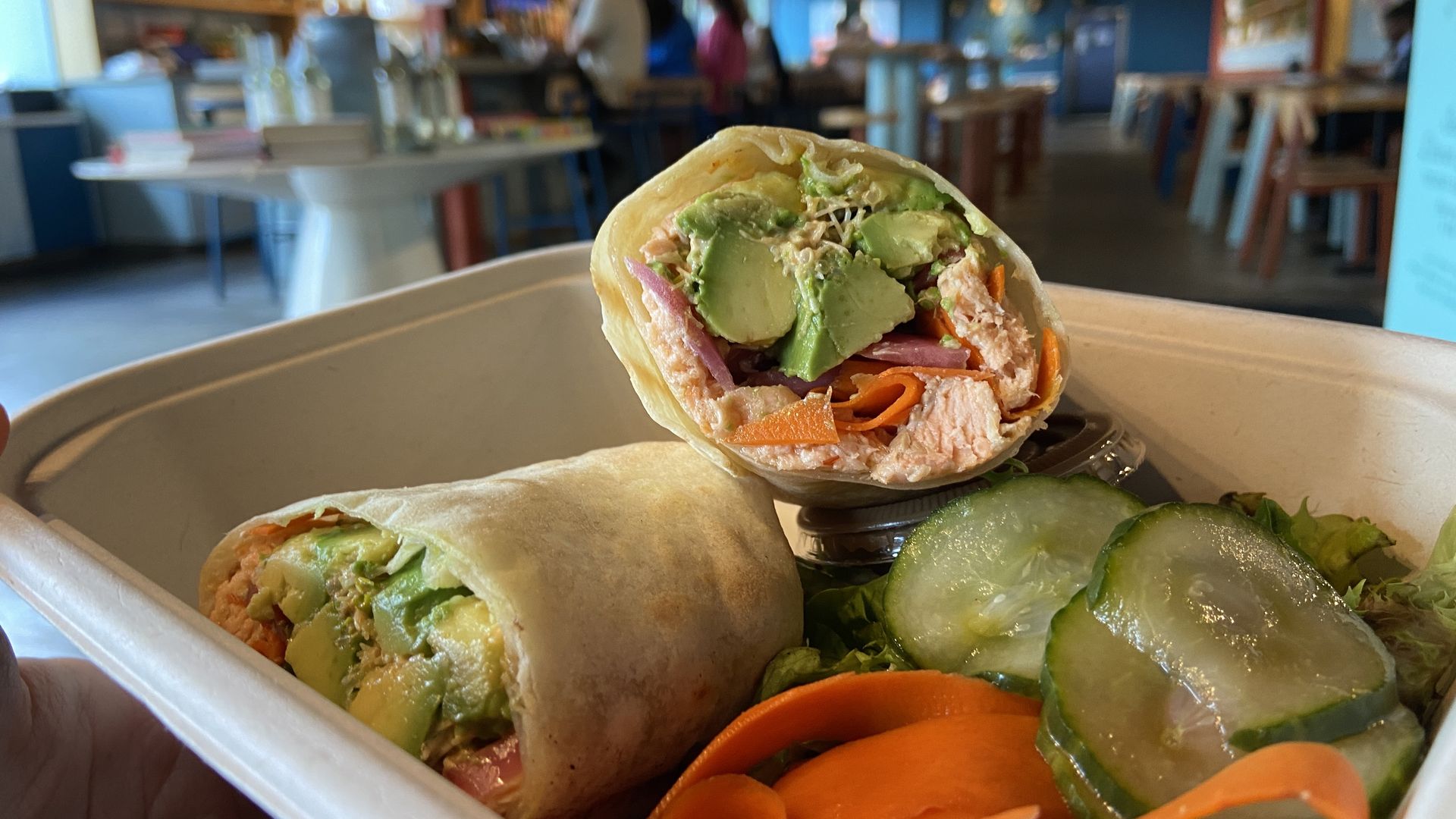 Grilled salmon, quinoa, pickled carrots, pickled cucumbers, alfalfa sprouts, pickled onions, chipotle mayo and avocado on a warmed gluten free wrap. ($14.75) Photo: Ashley Mahoney/Axios