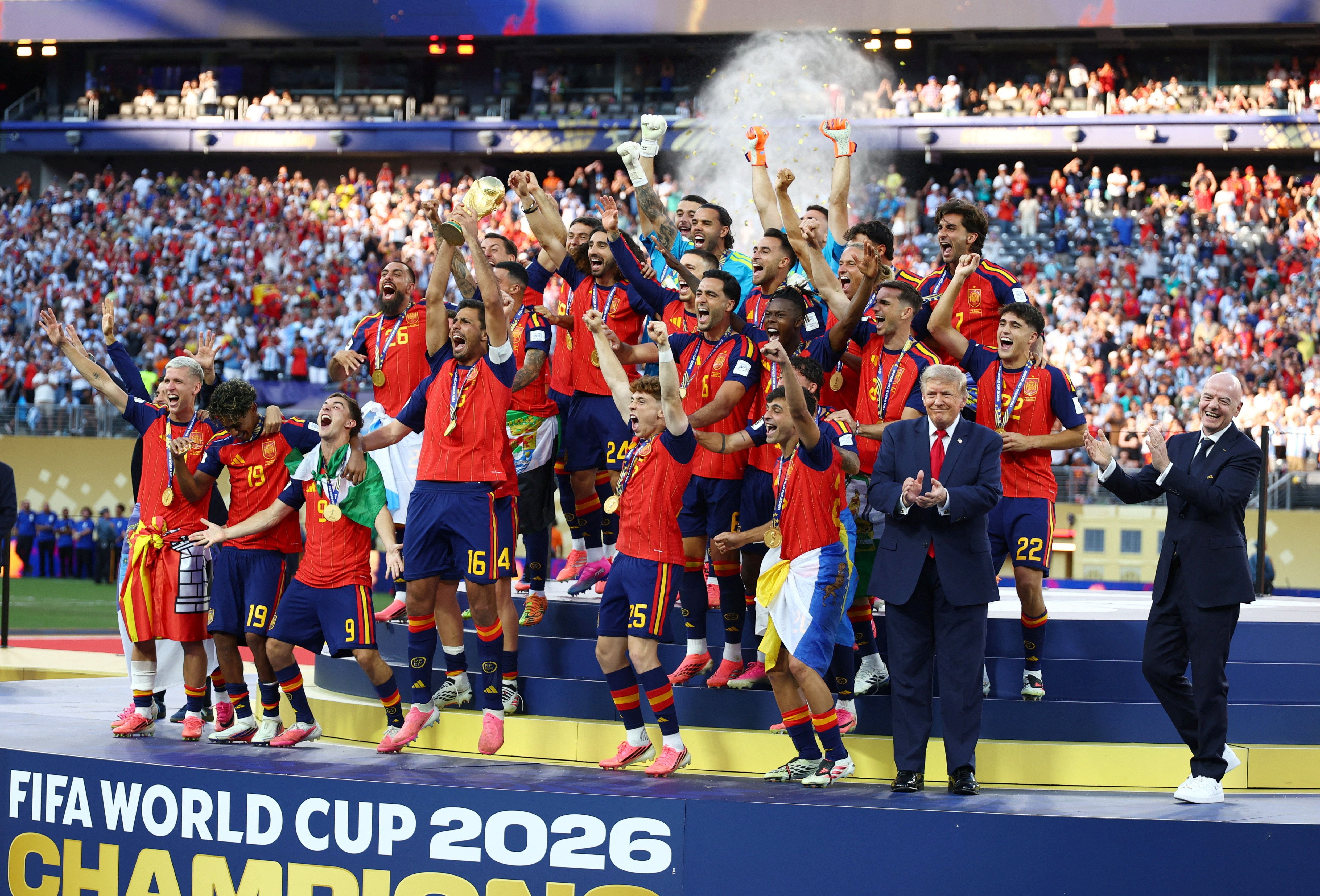 President Trump and FIFA President Gianni Infantino stand next to Spain as players lift the World Cup trophy.