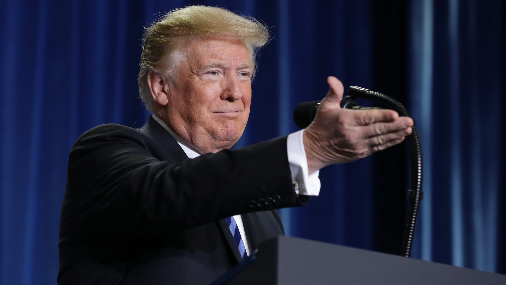 Donald Trump speaking from lectern