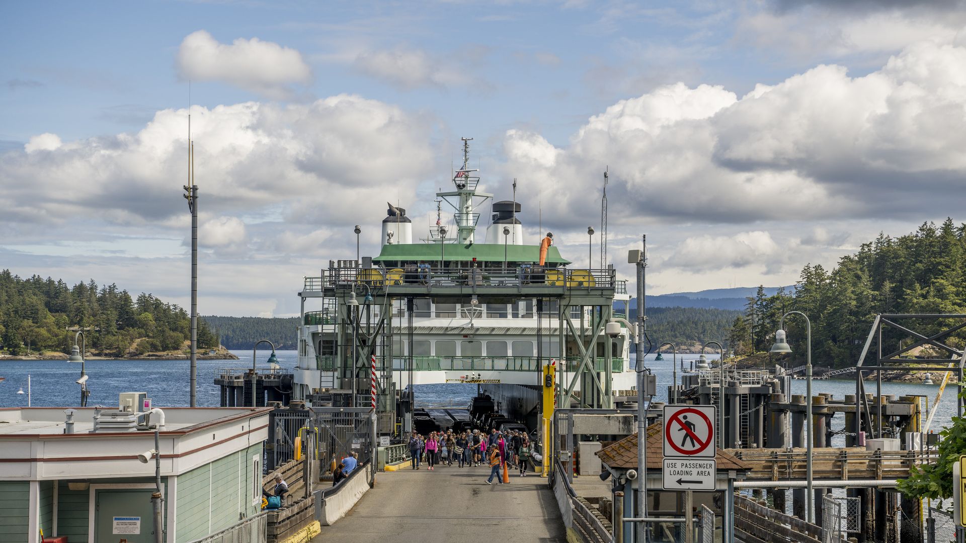 A ferry pulls into a loading dock on an island in Washington state. 