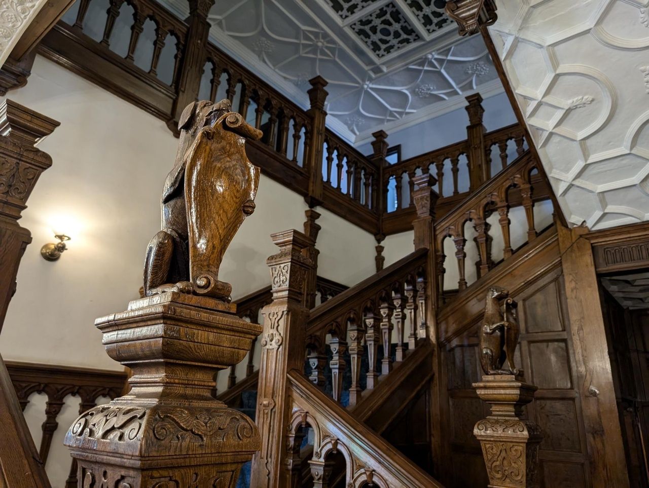 A staircase with ornate woodwork.