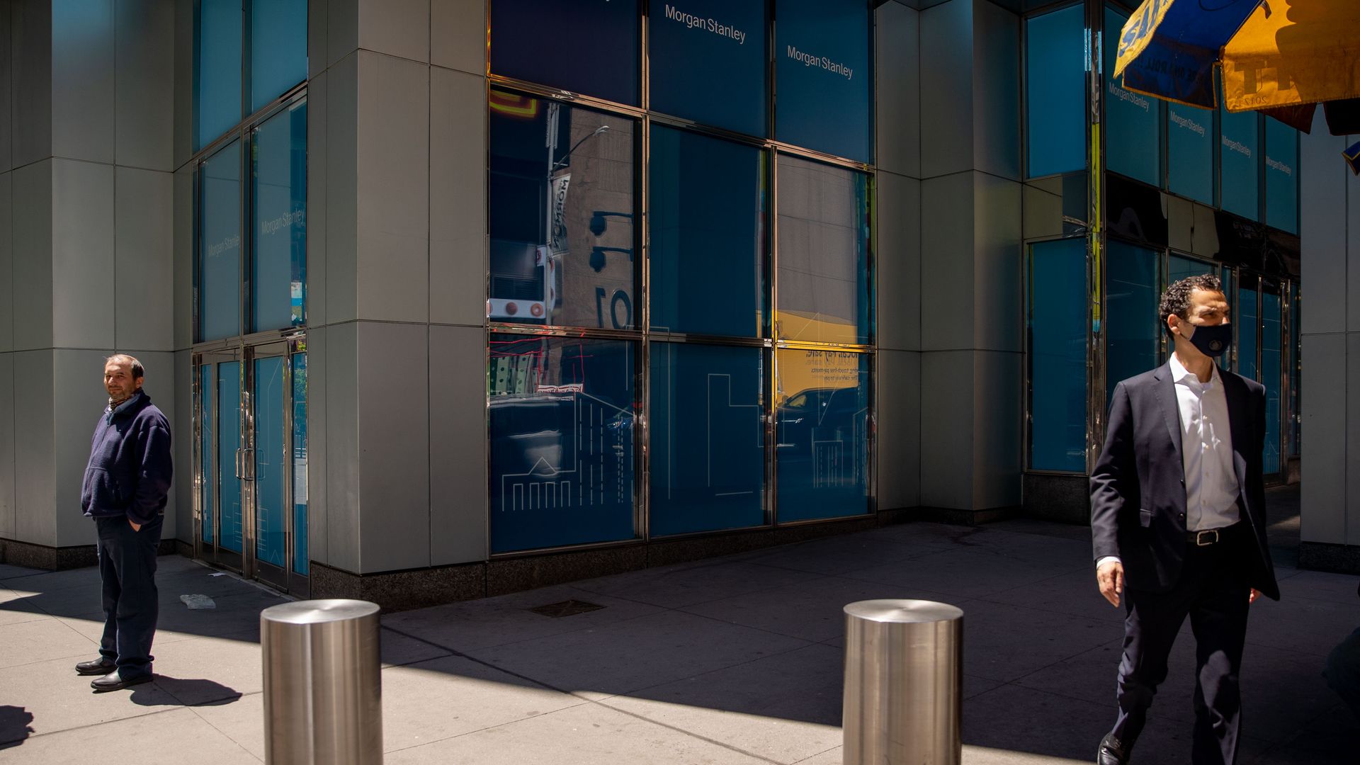 Pedestrians pass in front of Morgan Stanley headquarters in New York, U.S