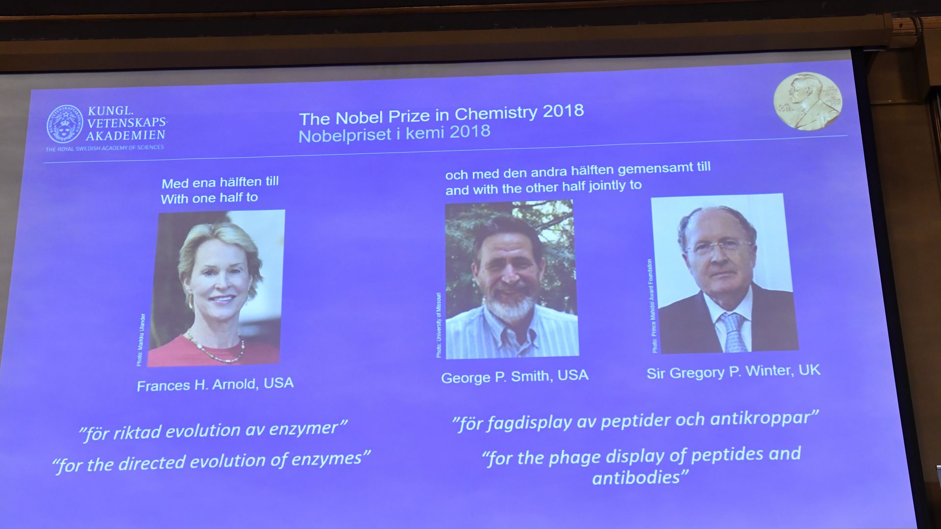 Screen with Nobel winners