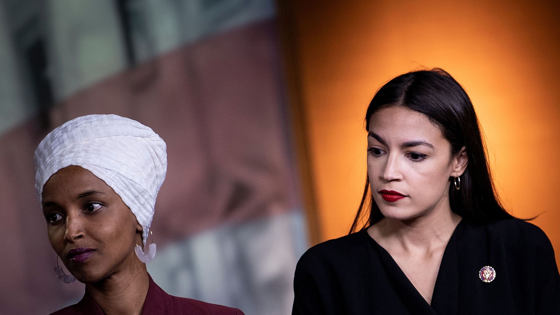 Reps. Ilhan Omar (D-MN) (L) and Alexandria Ocasio-Cortez (D-NY)