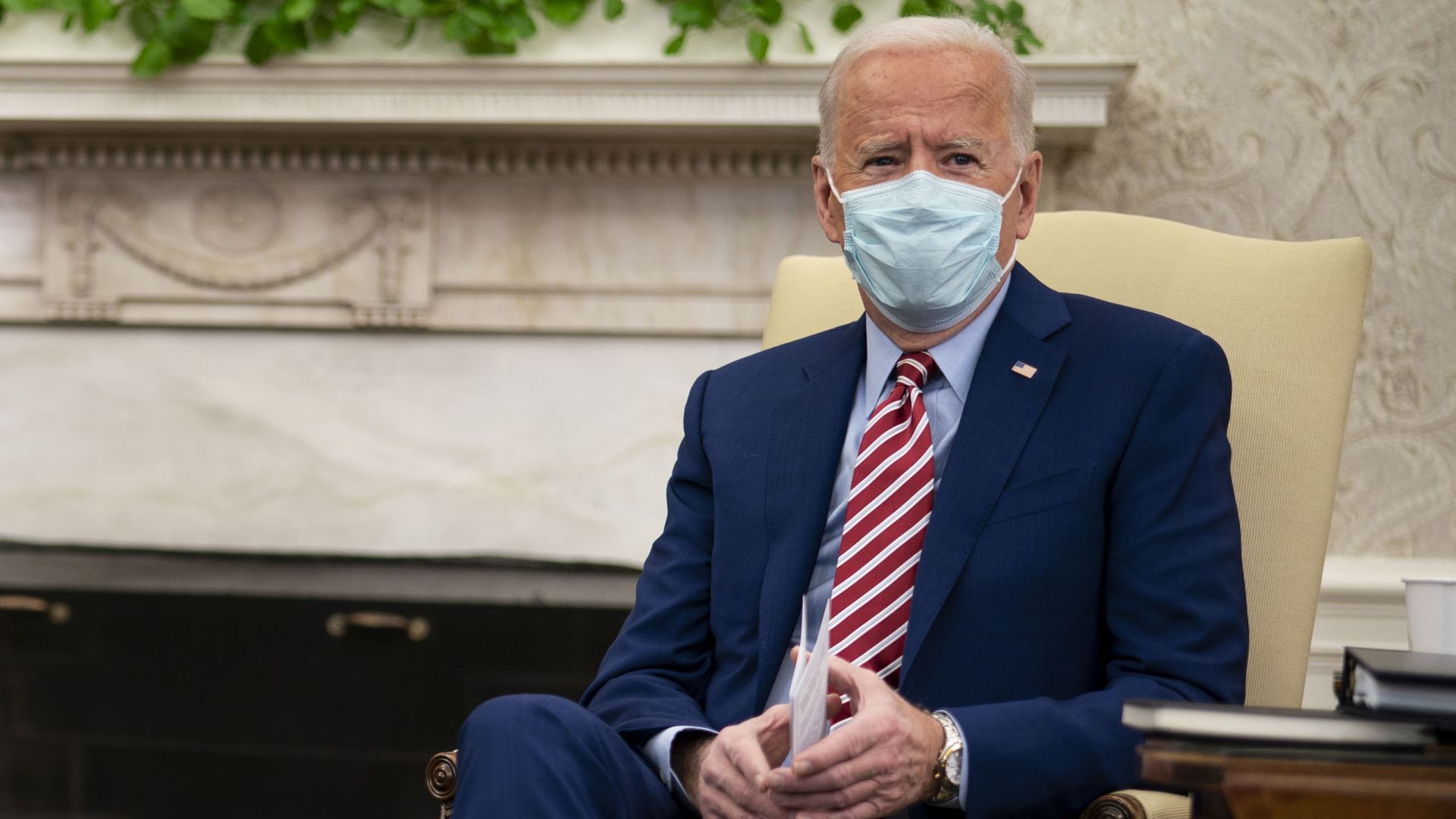 President Joe Biden speaks as he meets with Senators from both parties in the Oval Office of the White House on February 11