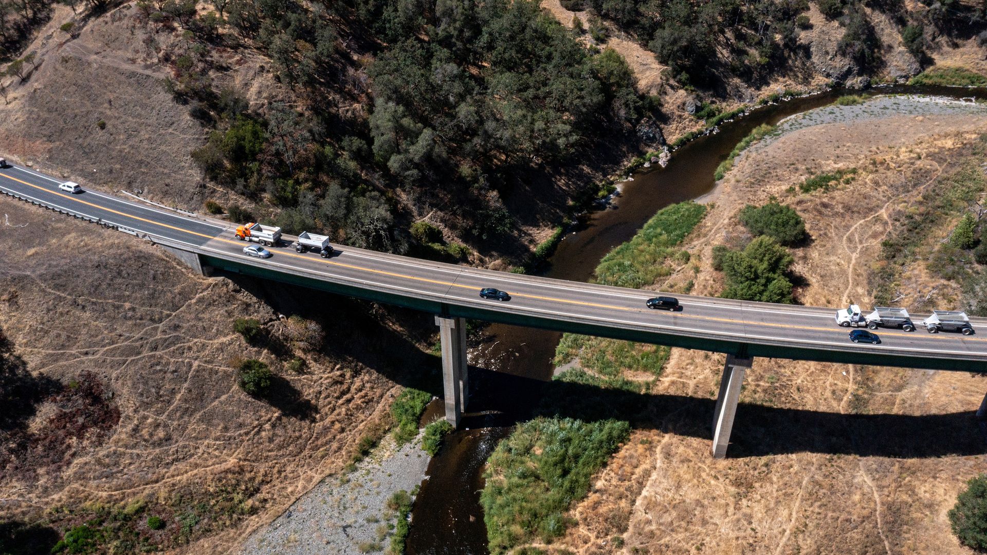 Traffic on Highway 20 over the East Fork Russian River at Lake Mendocino during a drought in Mendocino County, California
