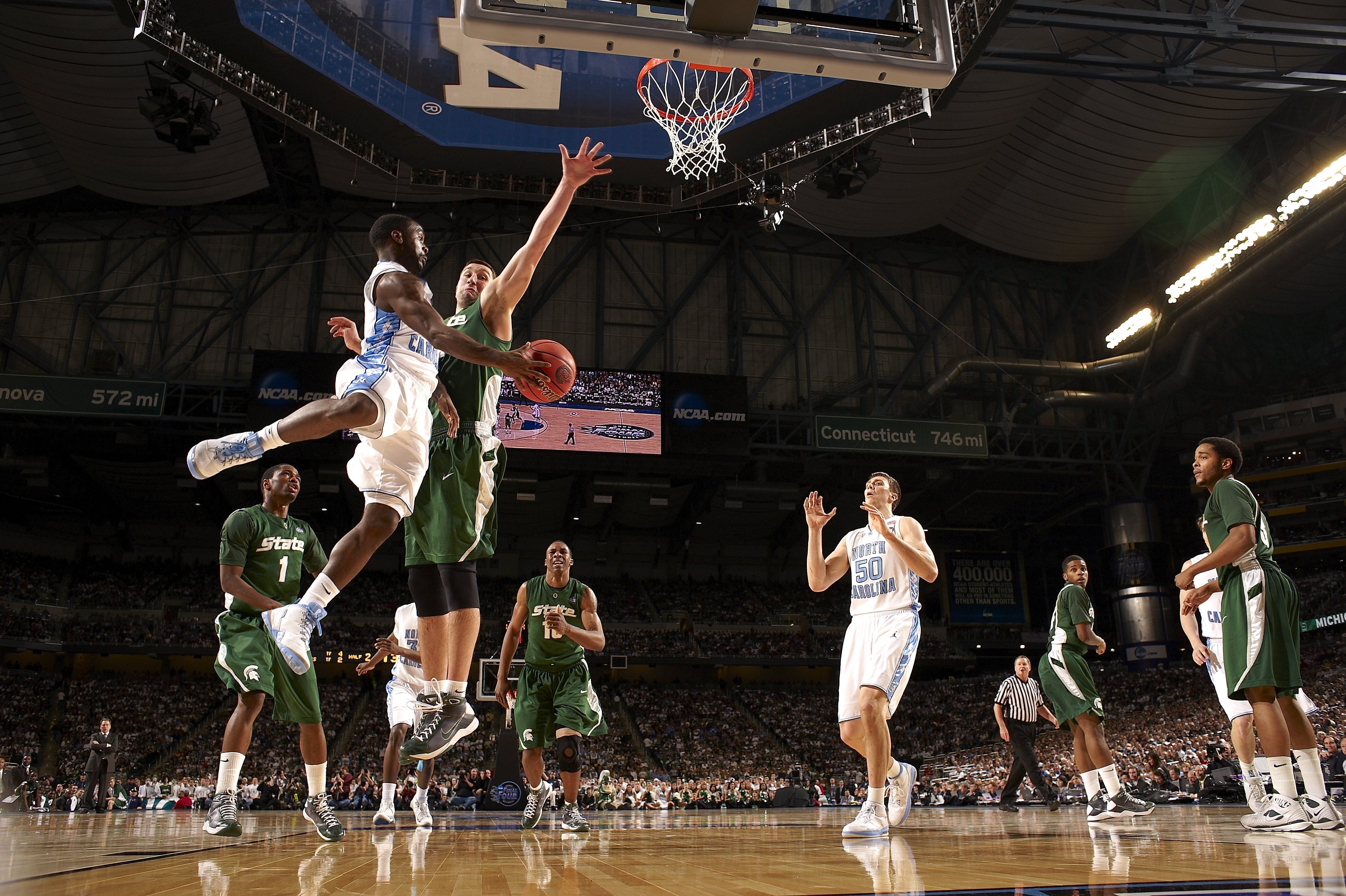 College Basketball: NCAA Final Four: North Carolina Ty Lawson (5) in action, making pass to Tyler Hansbrough (50) vs Michigan State Goran Suton (14) at Ford Field. Detroit, MI 4/6/2009 CREDIT: John Biever (Photo by John Biever /Sports Illustrated via Getty Images) (Set Number: X82140 TK2 F30 )