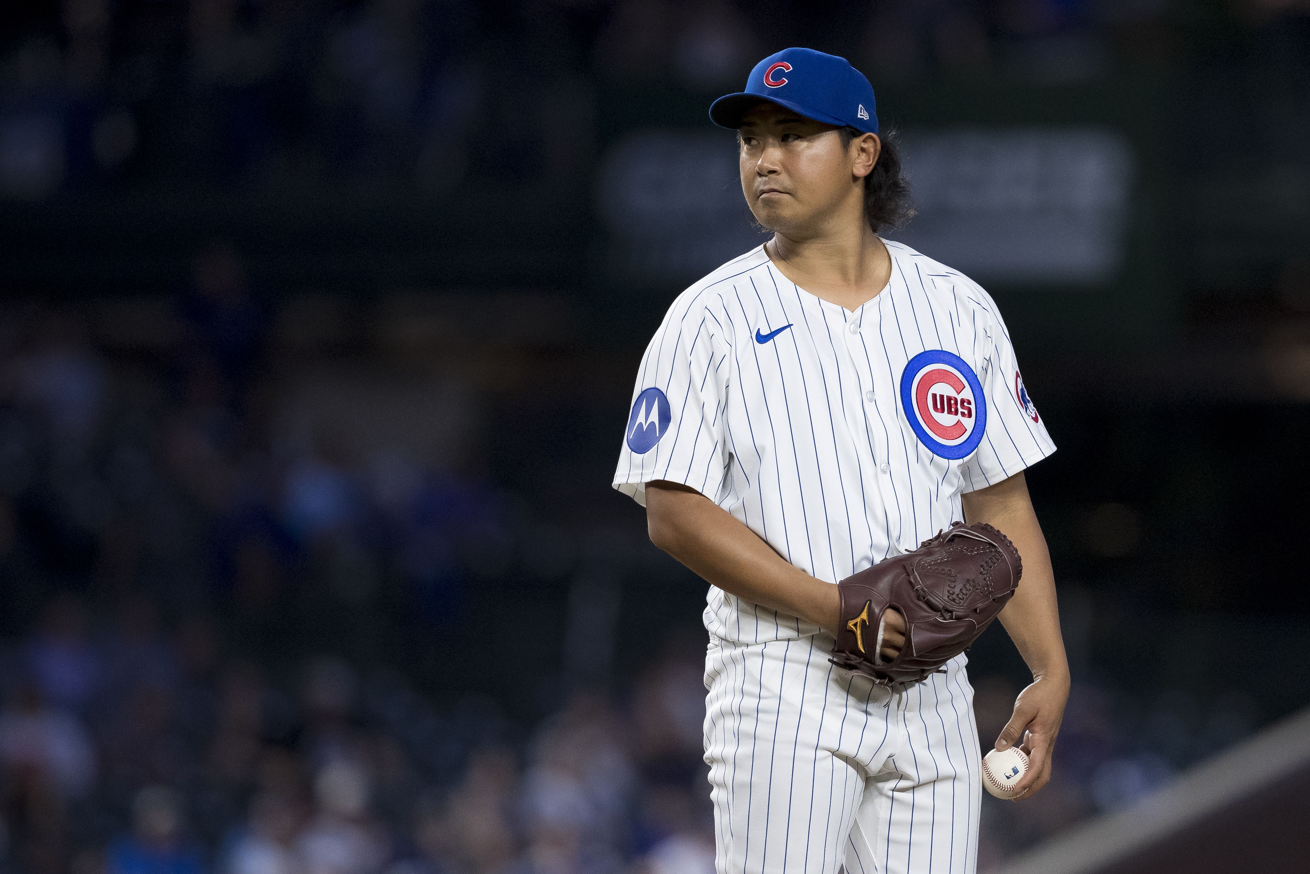 Photo of a pitcher on the mound during a baseball game 