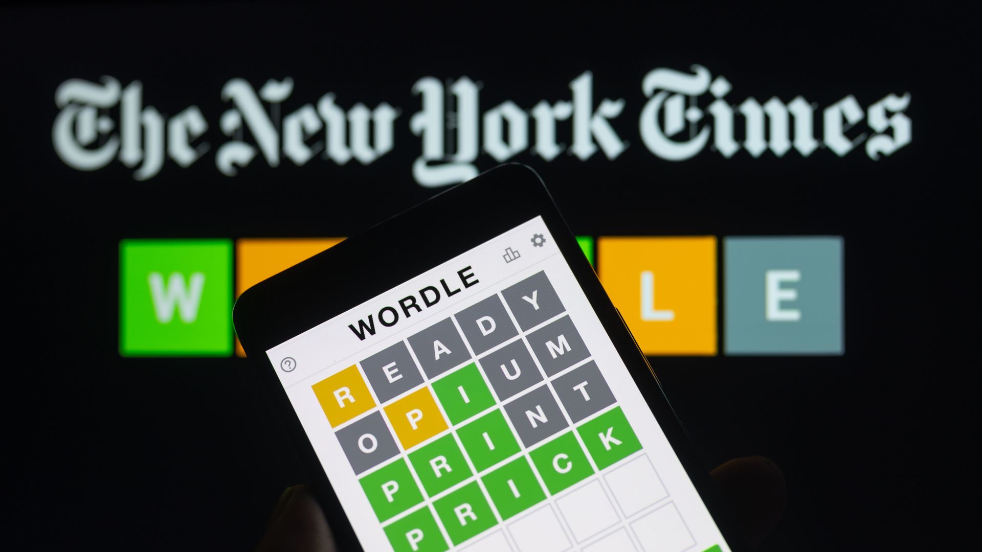 Wordle logo displayed on a smartphone with New York Time seen in the background. On 18 September 2023, in Brussels, Belgium.
