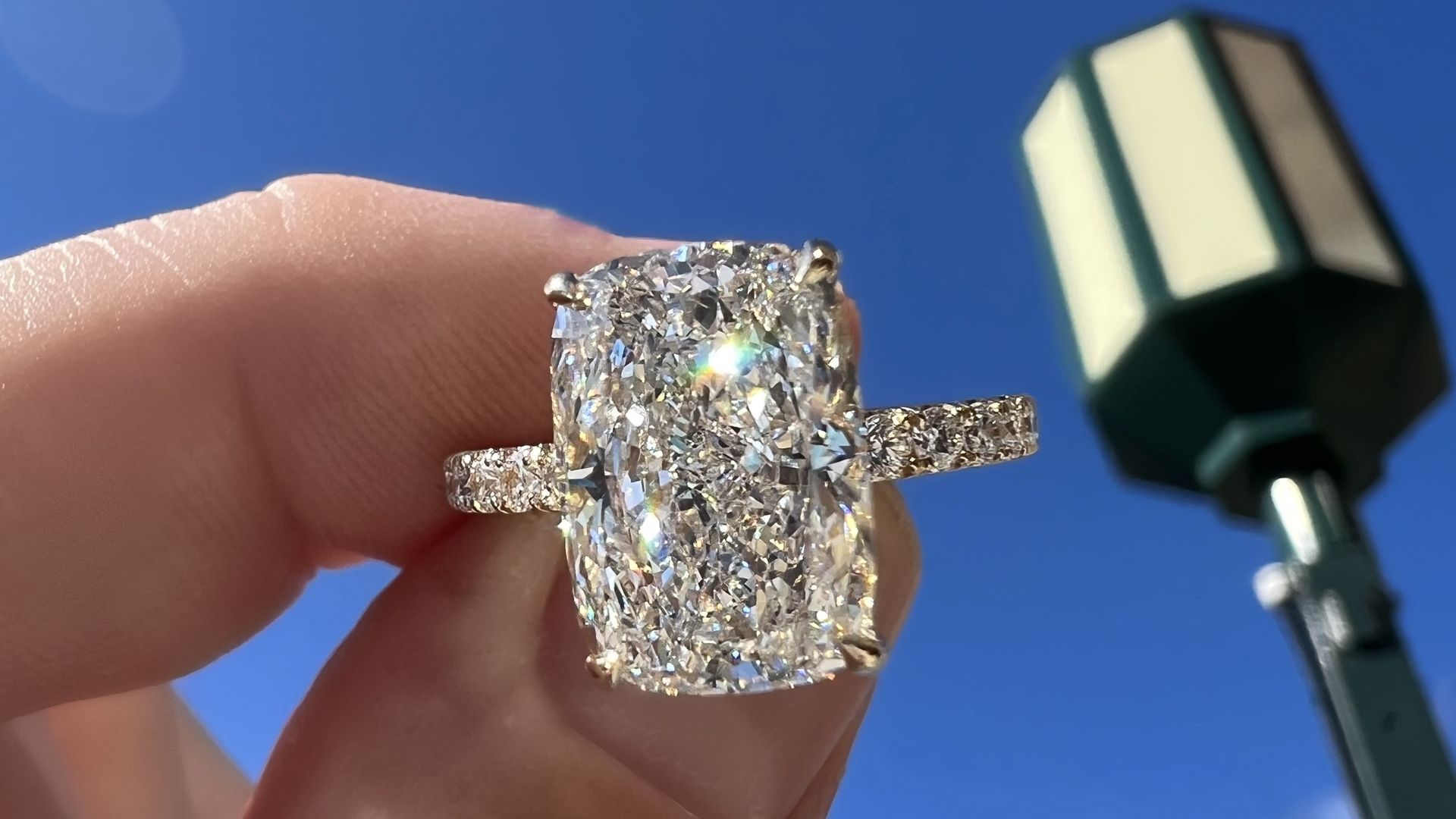 A diamond ring is shown gleaming in the sun.