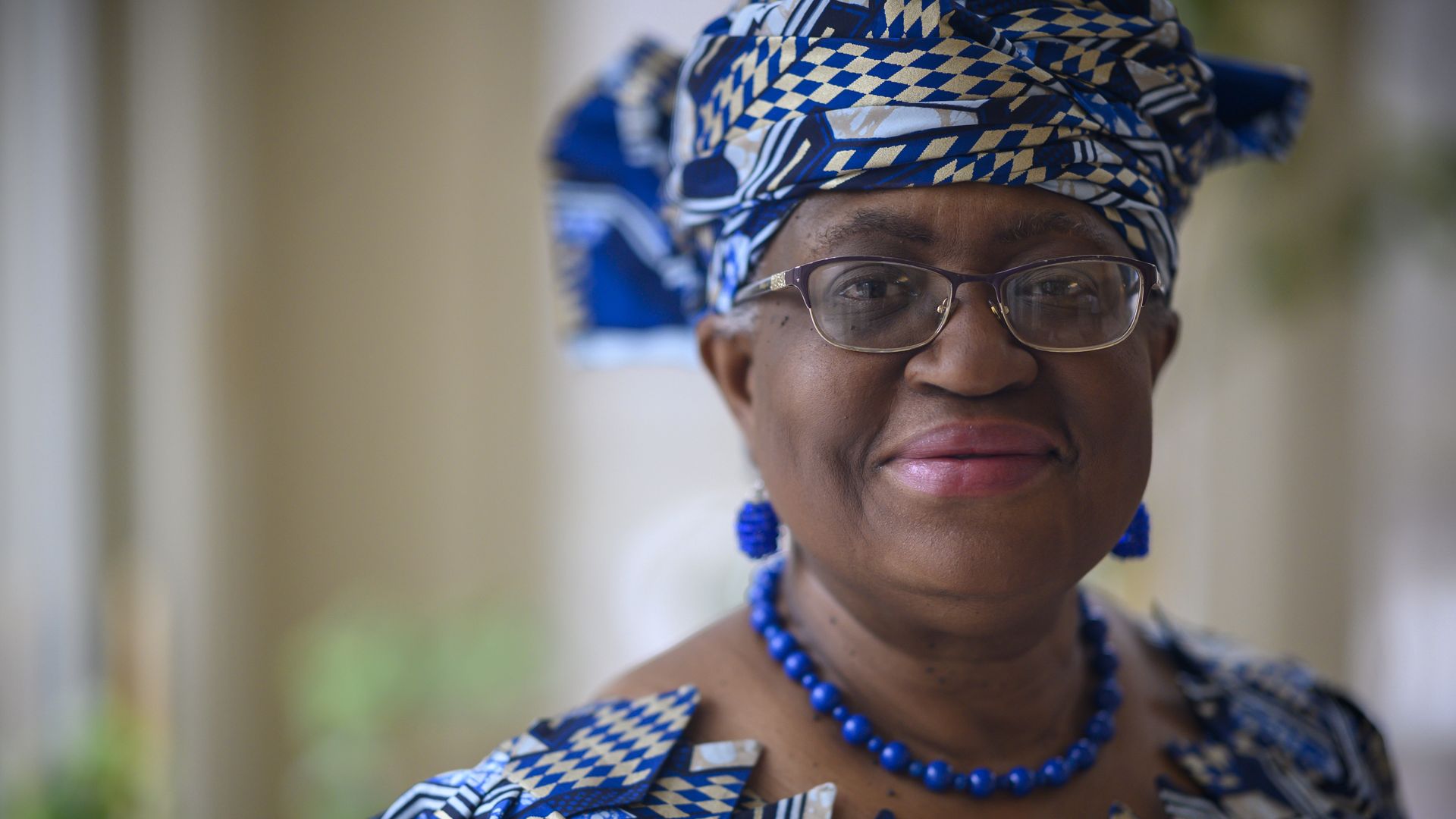 Nigeria's Ngozi Okonjo-Iweala poses in Potomac, Maryland minutes before she is confirmed Monday as the first woman and first African leader of the beleaguered World Trade Organization