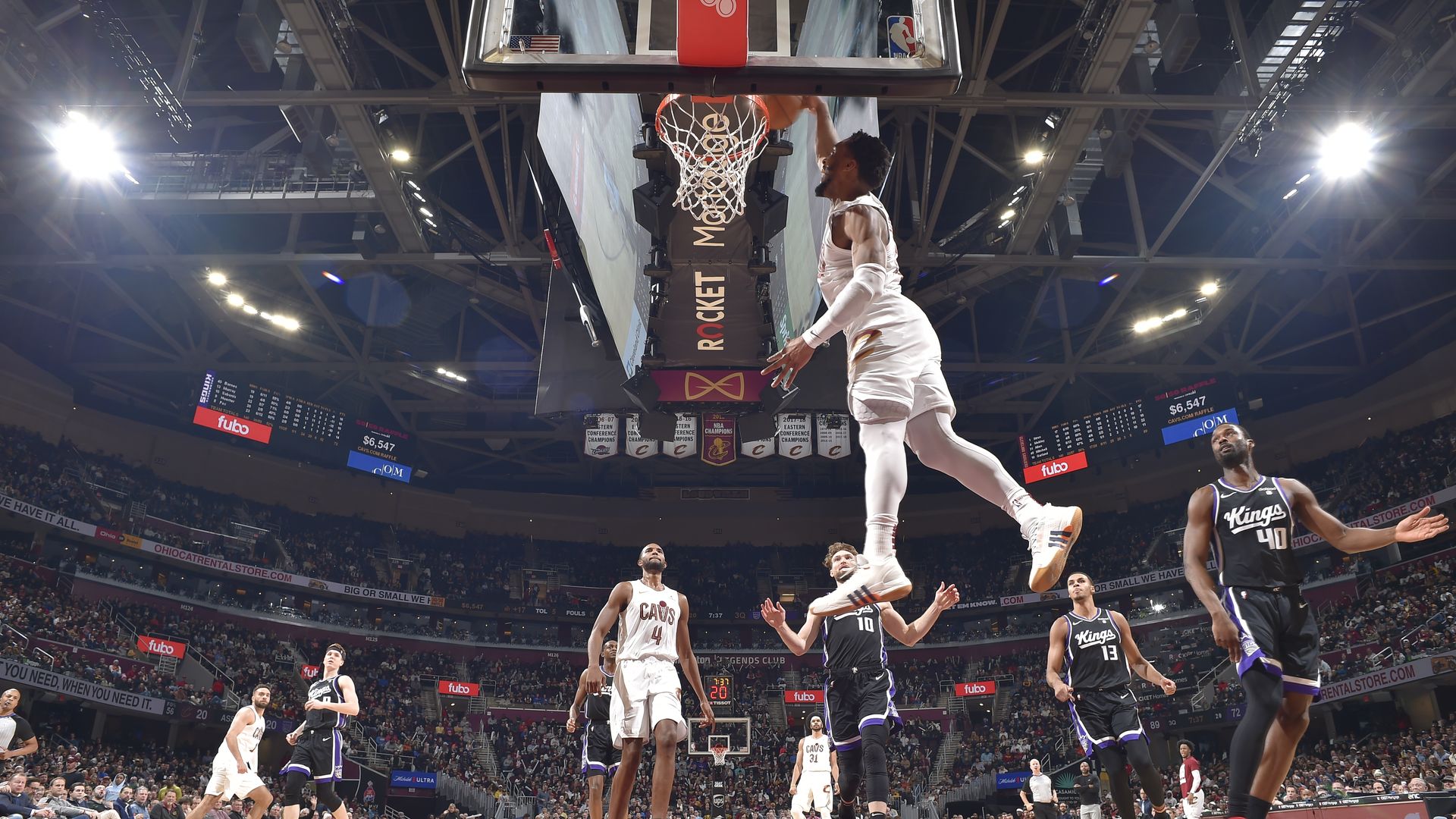 Donovan Mitchell #45 of the Cleveland Cavaliers dunks the ball during the game against the Sacramento Kings on February 5, 2024 at Rocket Mortgage FieldHouse in Cleveland, Ohio. 