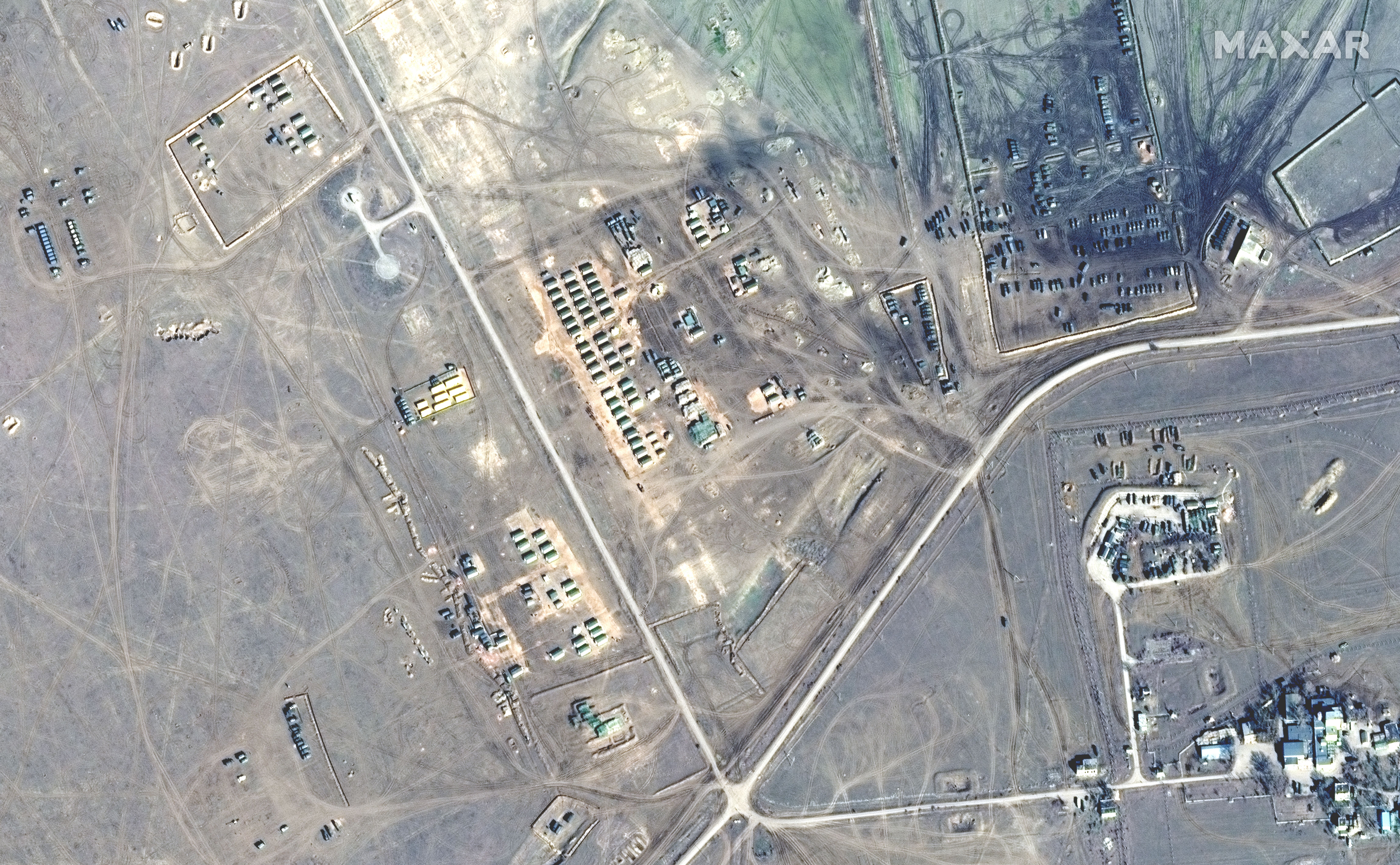An image of tents and artillery pieces stationed in Crimea captured on Feb. 16.