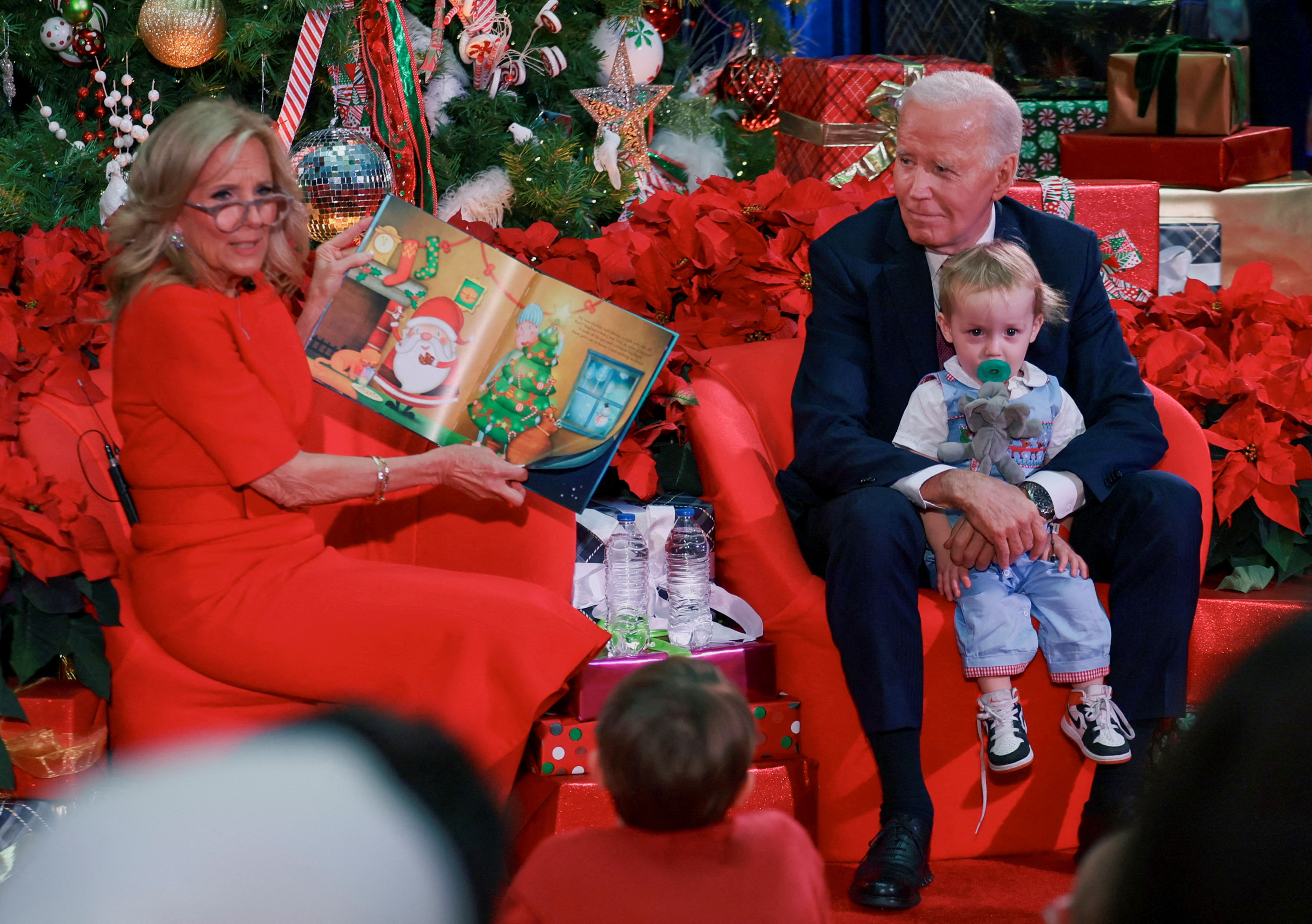 President Biden and First Lady Jill Biden read to children at Children's National Hospital in Washington on Friday. Photo: Leah Millis/Reuters
