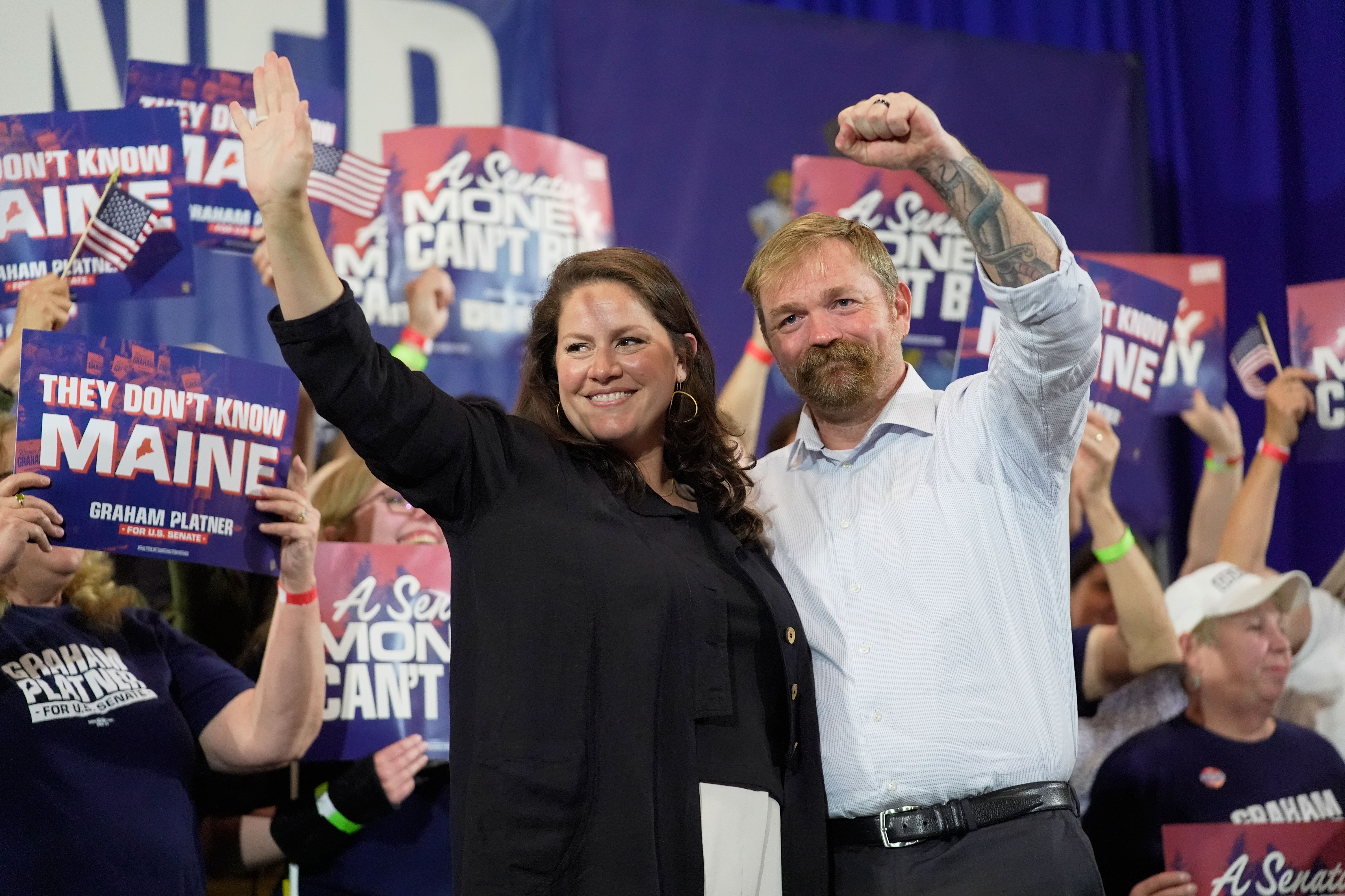 Democratic Senate candidate Graham Platner and his wife Amy Gertner at an election night watch party in Blue Hill, Maine.