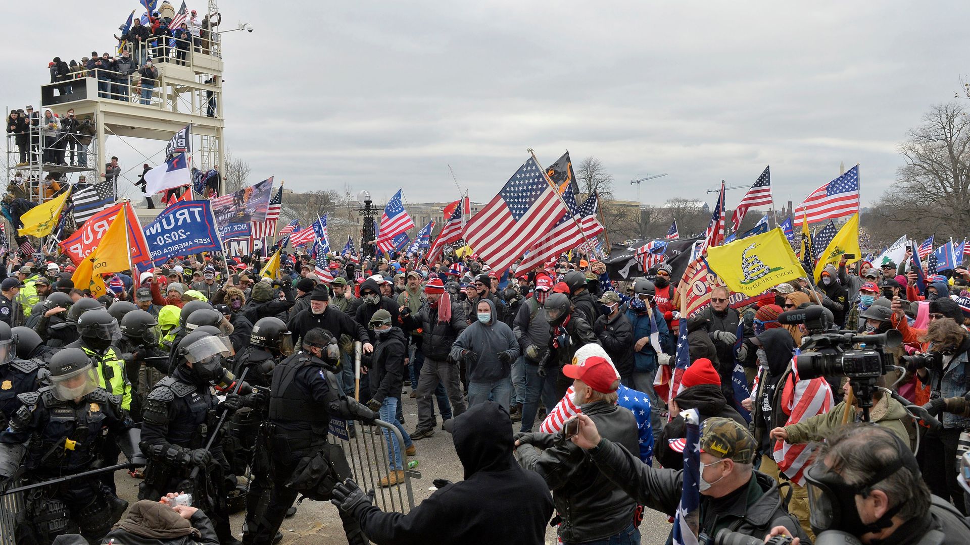 Trump supporters clash with police and security forces as they try to storm the US Capitol in Washington, DC on January 6