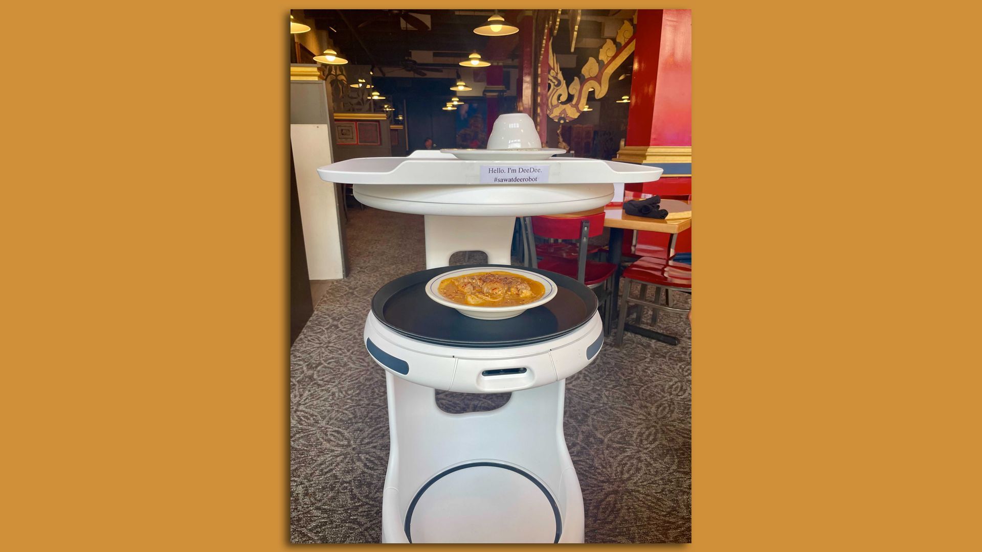 DeeDee, Minnesota's first robot server, delivers curry at Sawatdee in Minneapolis.