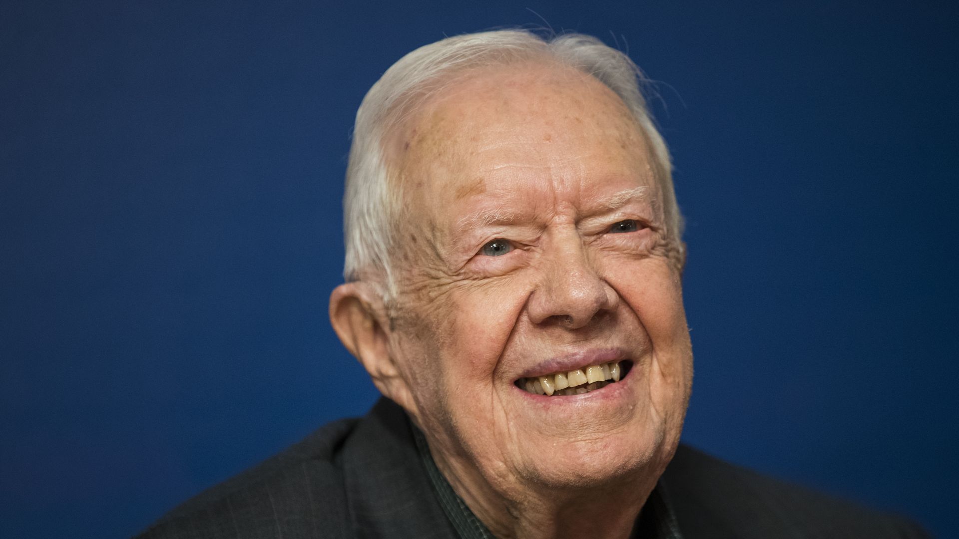 Former U.S. President Jimmy Carter smiles during a book signing event for his new book 'Faith: A Journey For All' at Barnes & Noble bookstore in Midtown Manhattan, March 26, 2018 in New York City. 